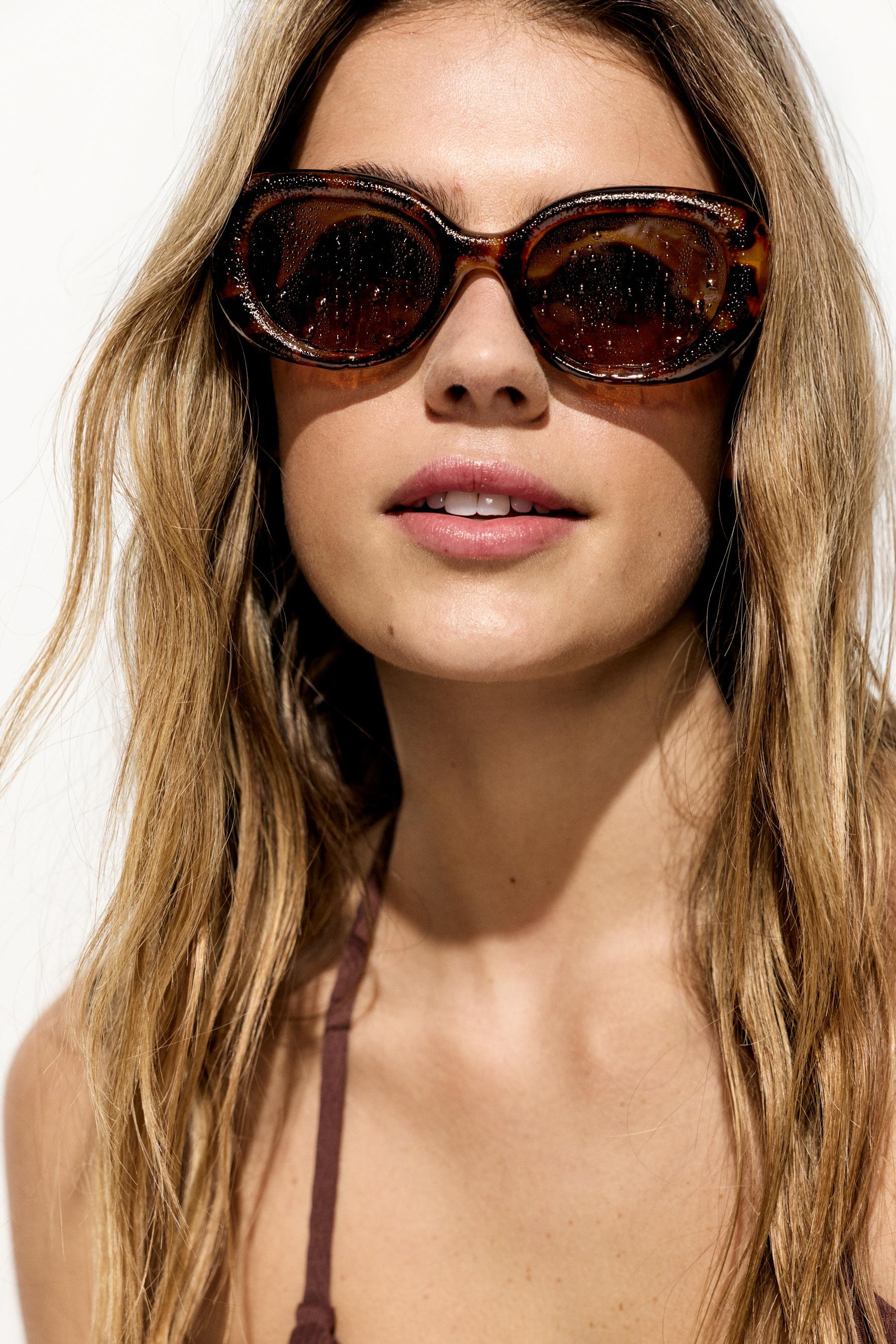Oval tortoiseshell-effect glasses — TORTOISESHELL