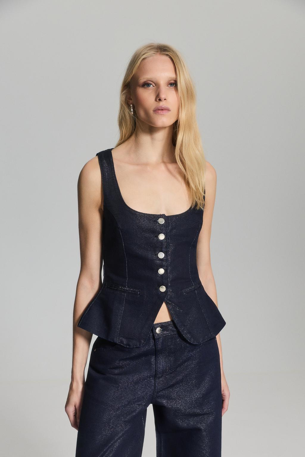 Chaleco denim brillos
