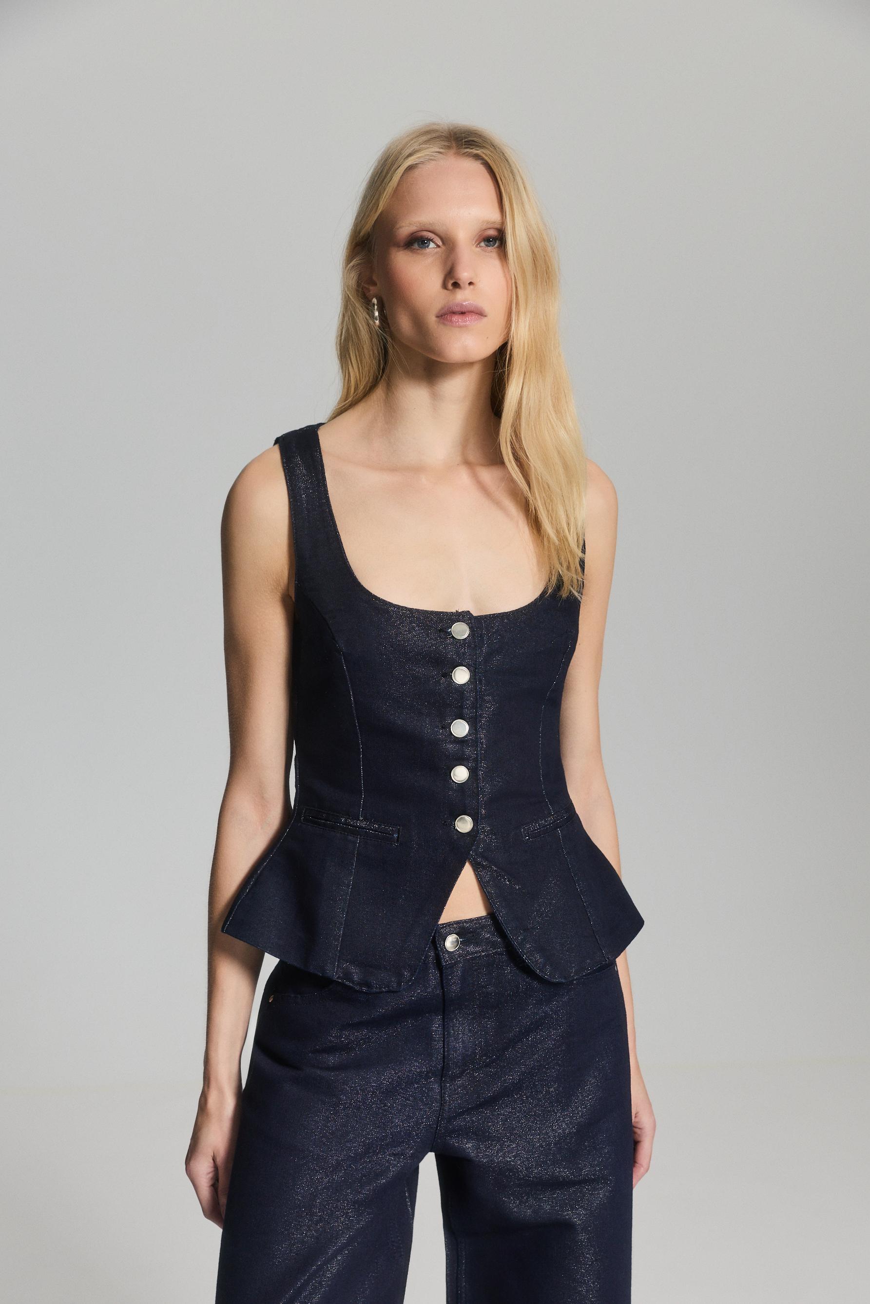 Chaleco denim brillos