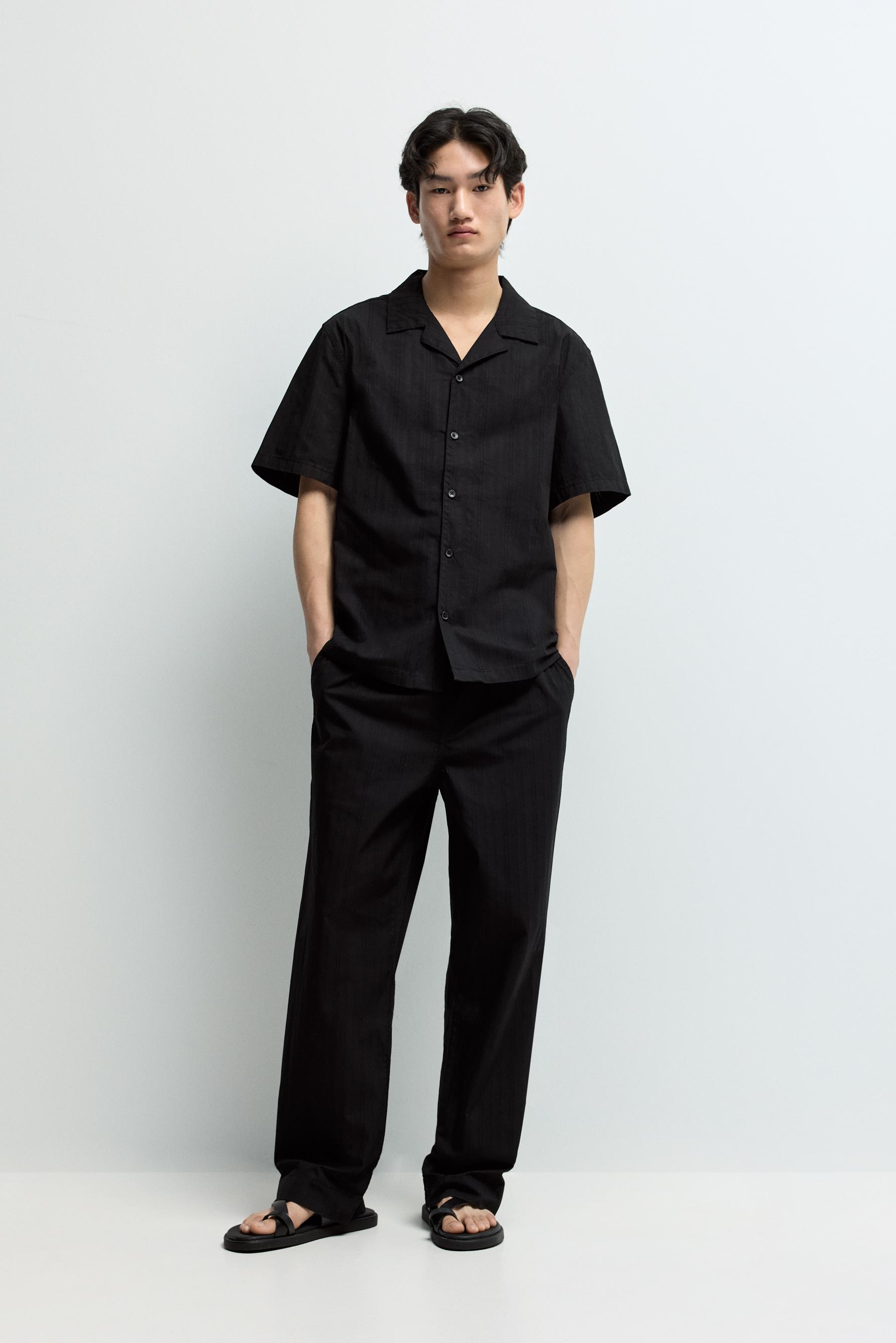 Pantalón wide leg textura