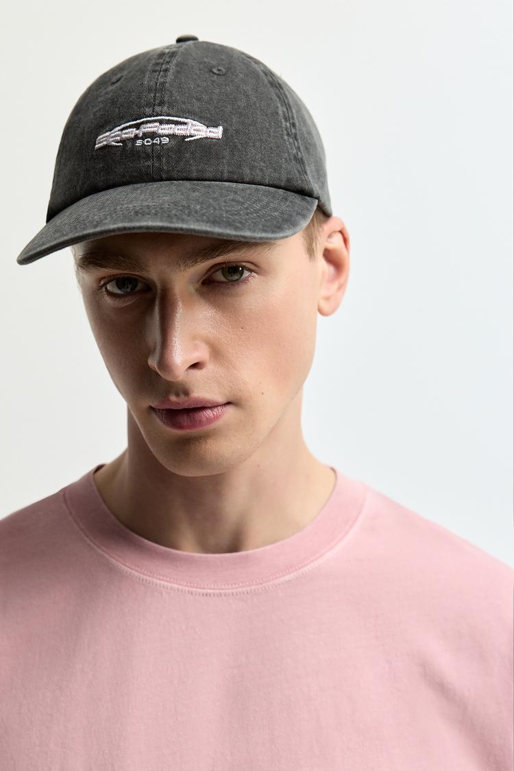 Faded-effect embroidered cap — BLACK