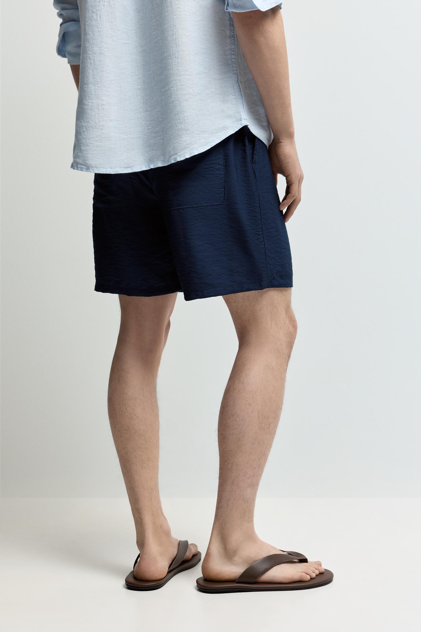 Flowing pleated Bermuda shorts — NAVY