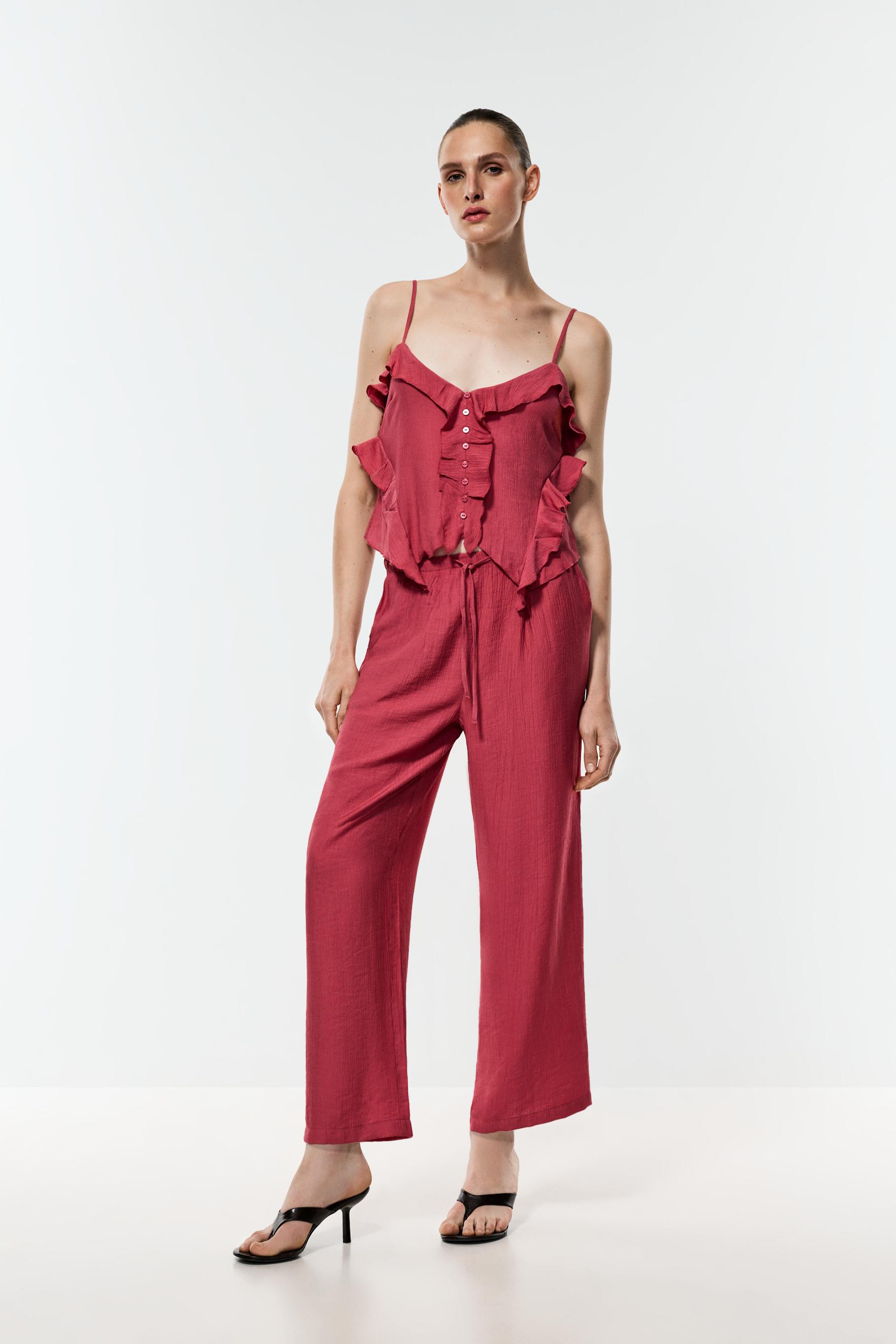 Textured jogging trousers — PALE MAROON
