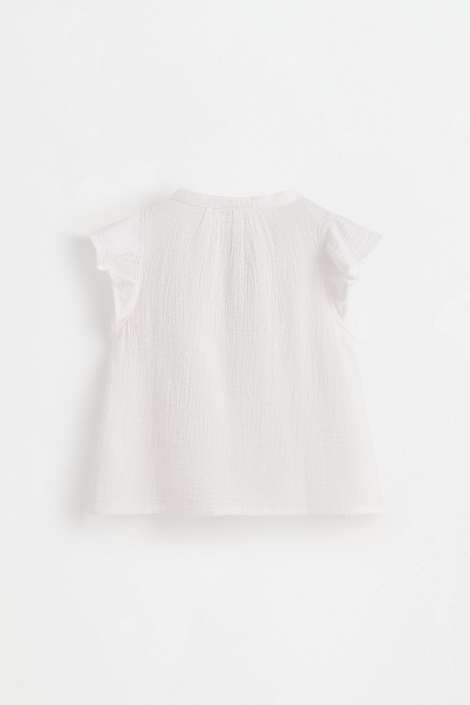 Double gauze ruffled blouse — OFF WHITE