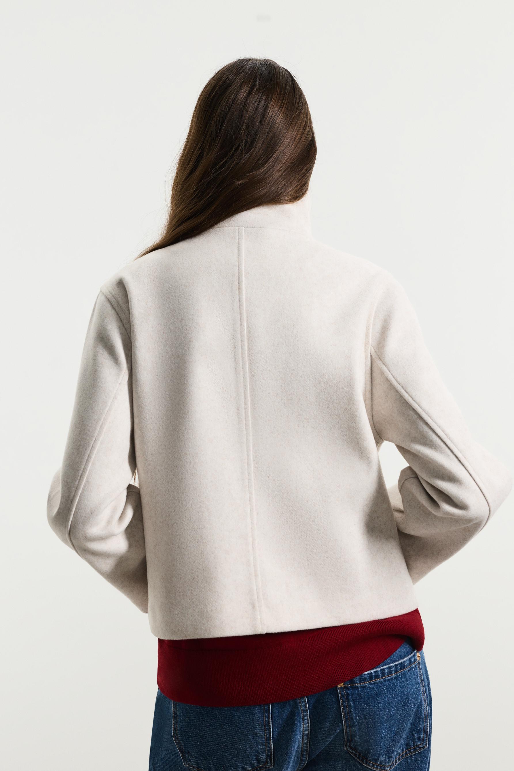 Short funnel neck jacket — SAND