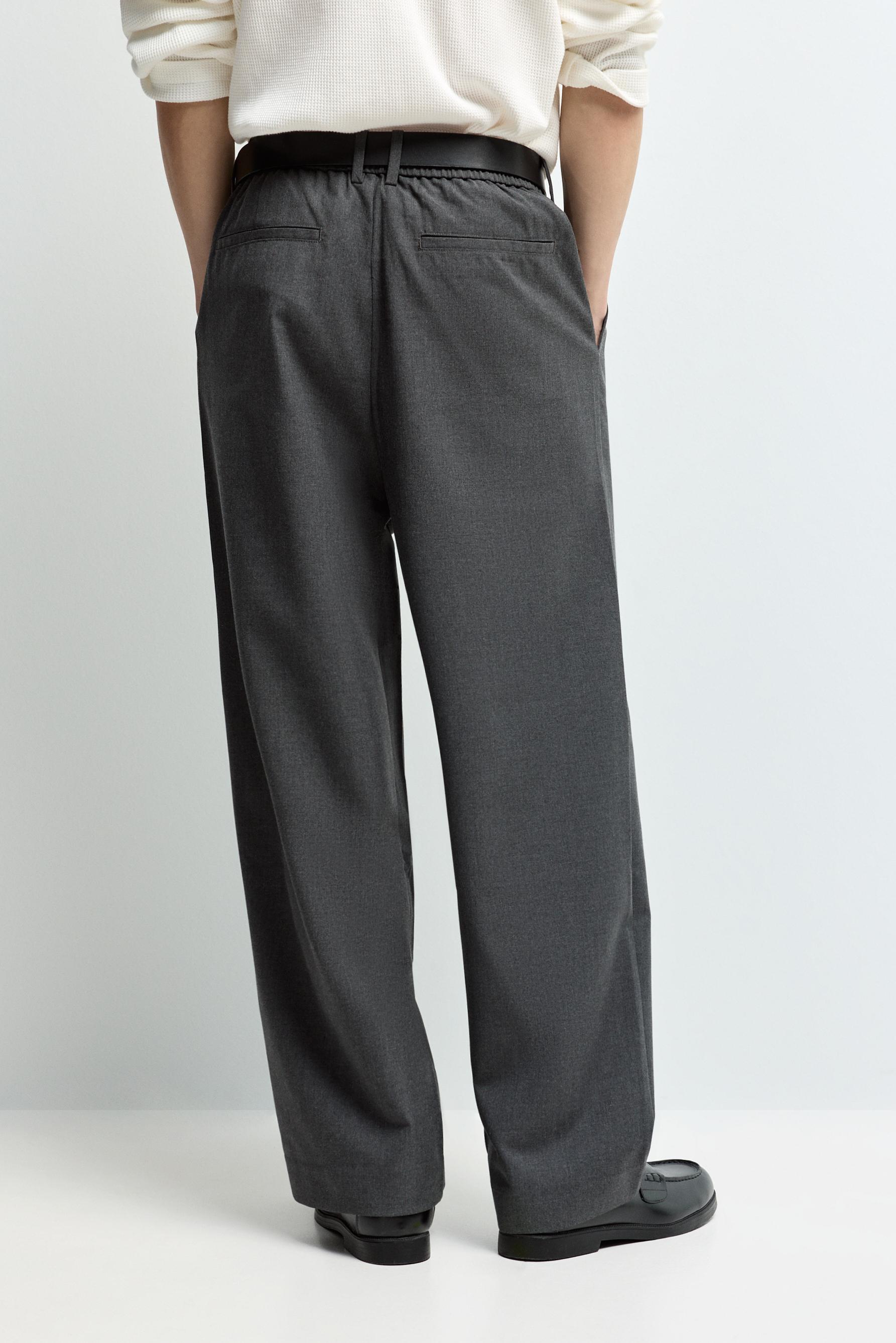 Baggy trousers with darts — DARK GREY MARL