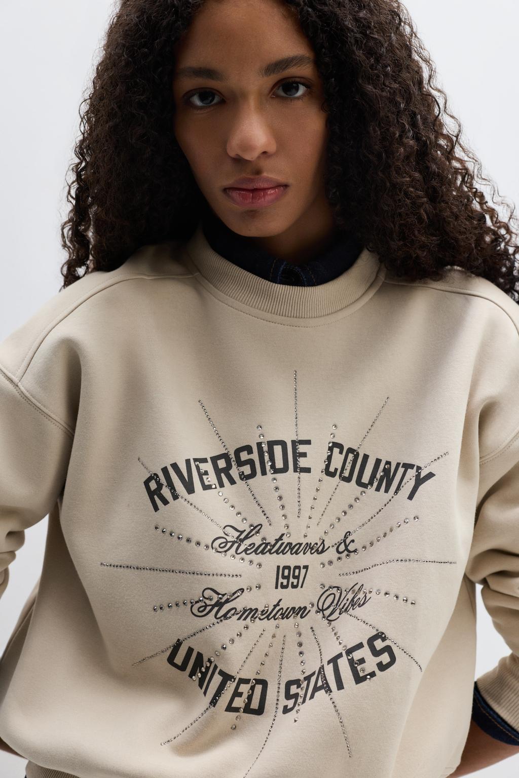 Sweatshirt com strass