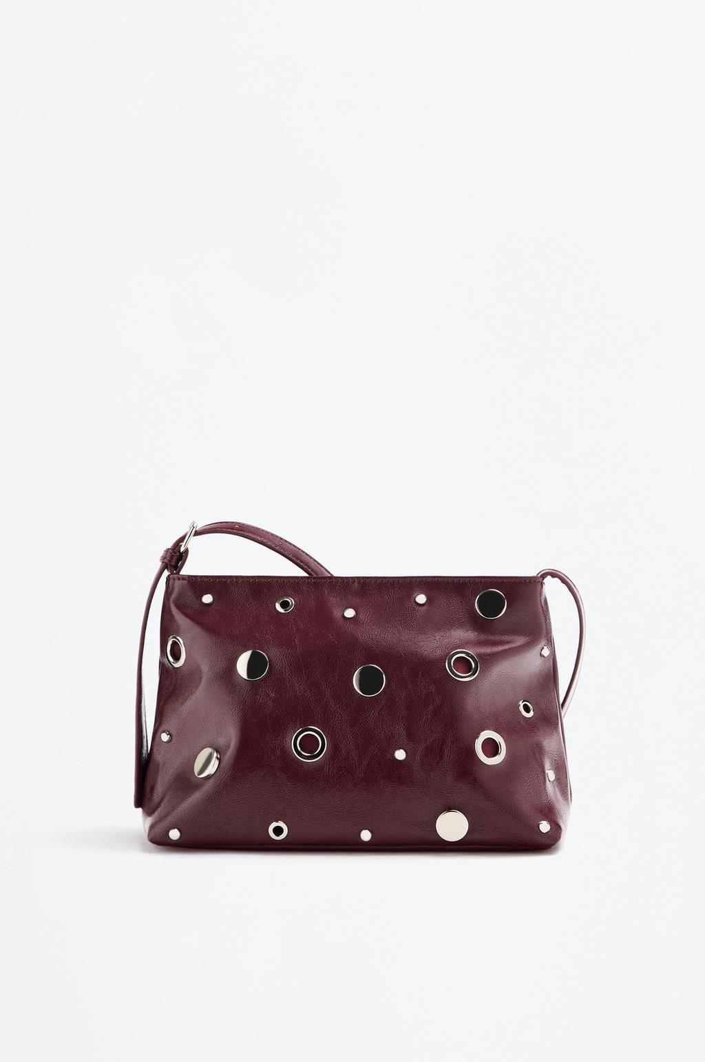 Stud and eyelet crossbody bag