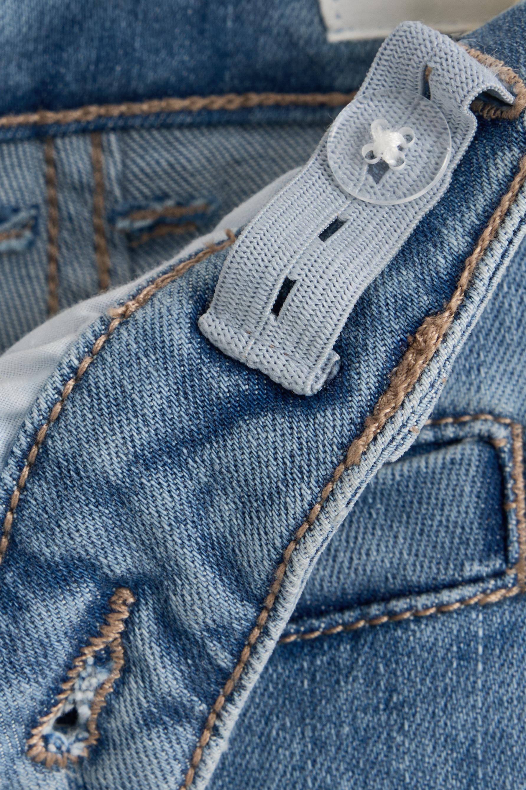 Bell bottom jeans with buttons — PALE BLUE