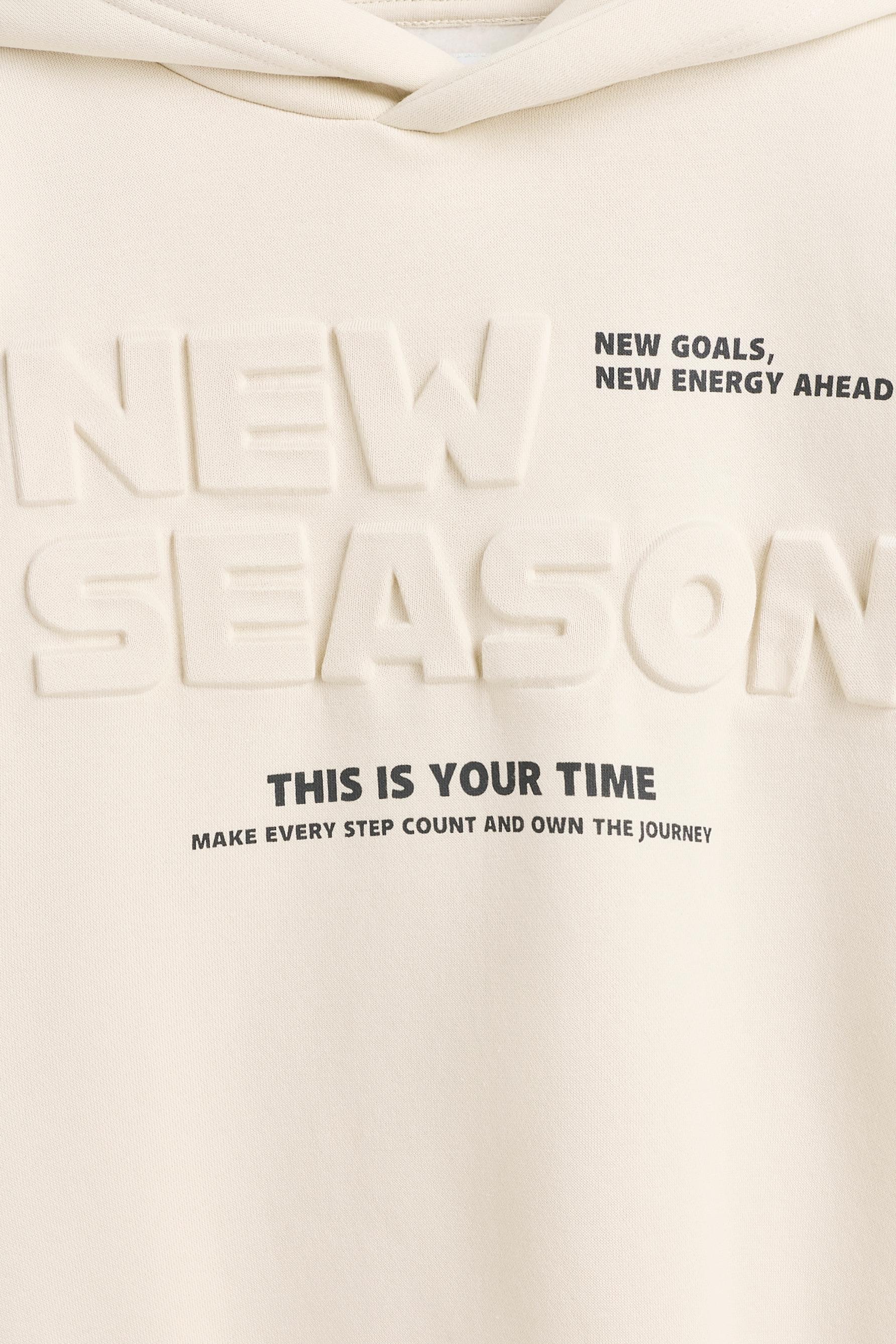 Hoodie with raised text — GREY