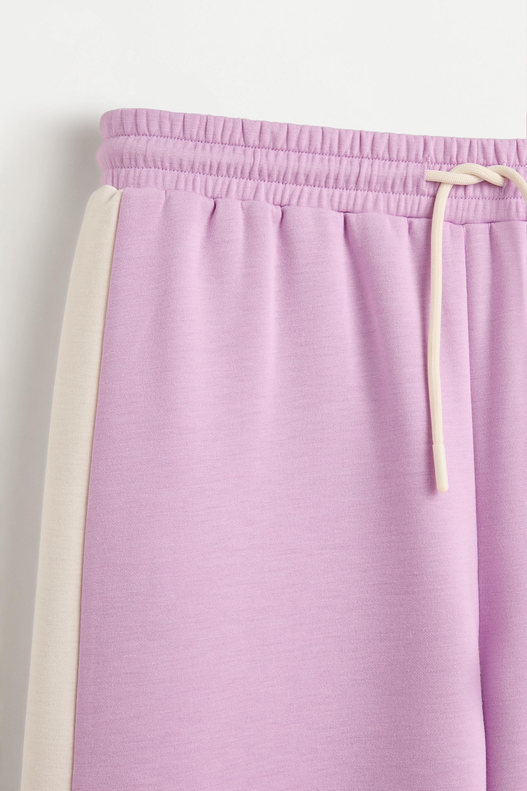 Wide-leg trousers with side stripes — MAUVE