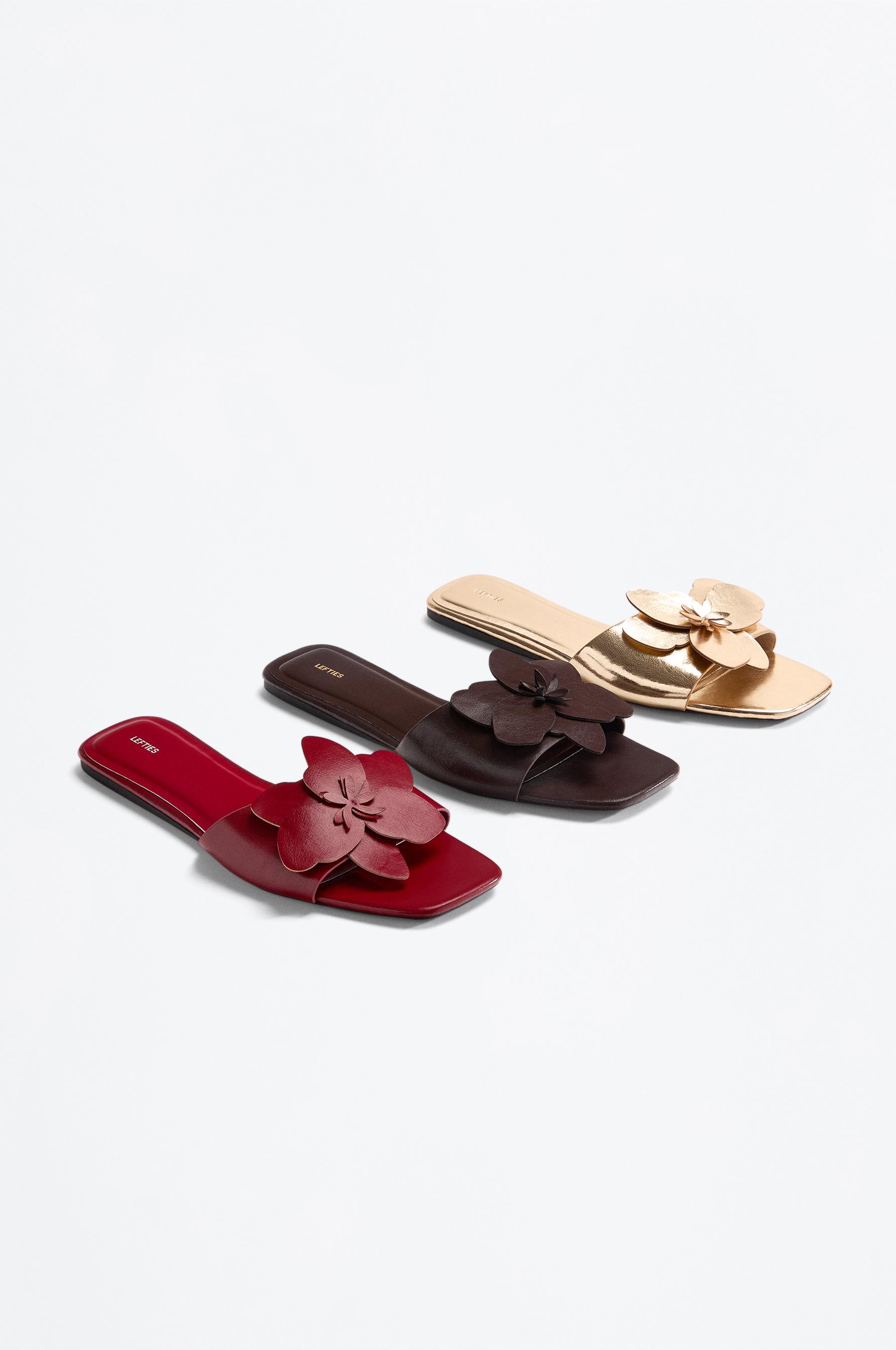 Flat slider sandals with flower detail — RED