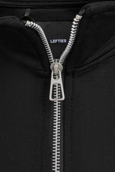 Interlock high-neck jacket — BLACK 7