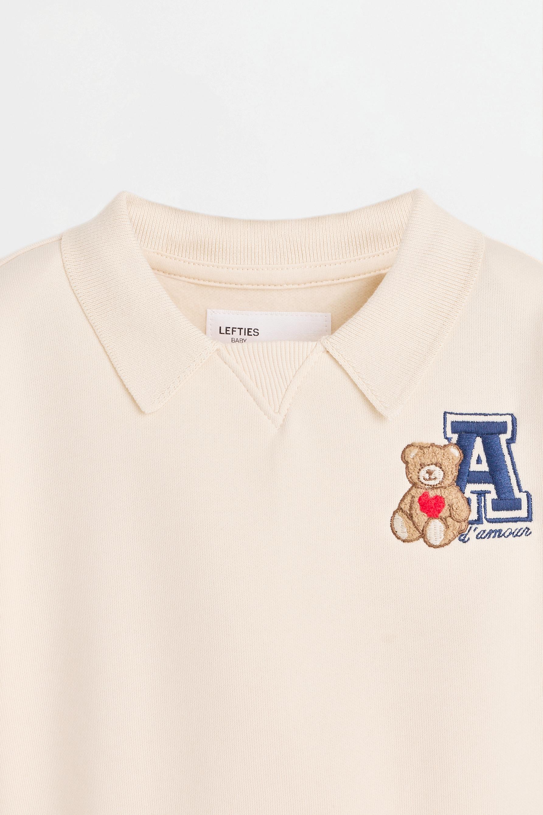 Polo sweatshirt and bow trousers set — ECRU