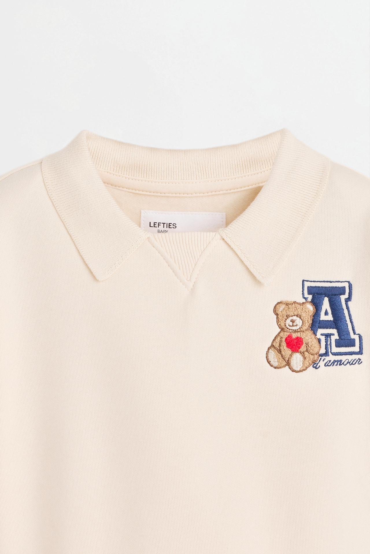Polo sweatshirt and bow trousers set — ECRU