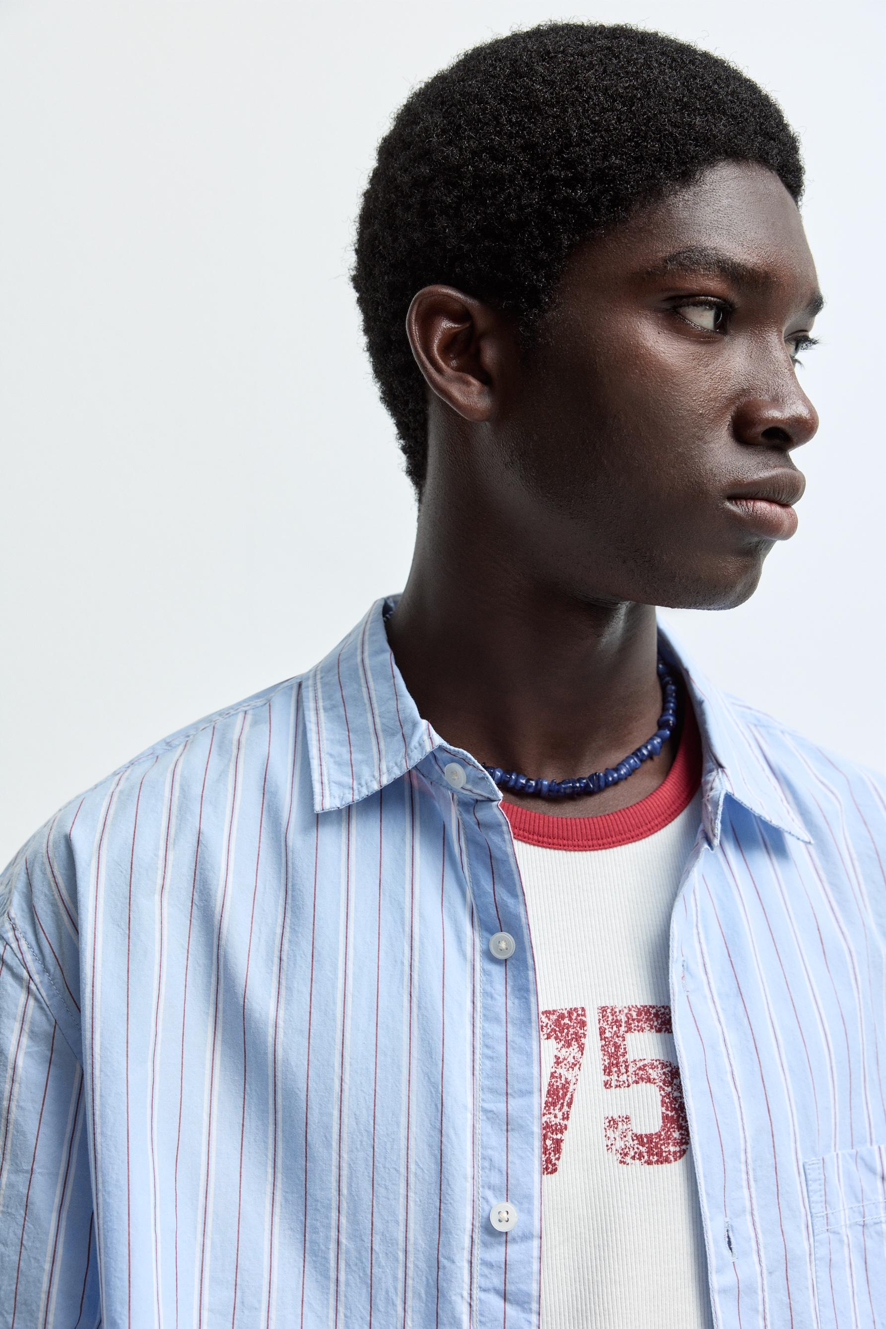 Printed strappy T-shirt — OFF WHITE