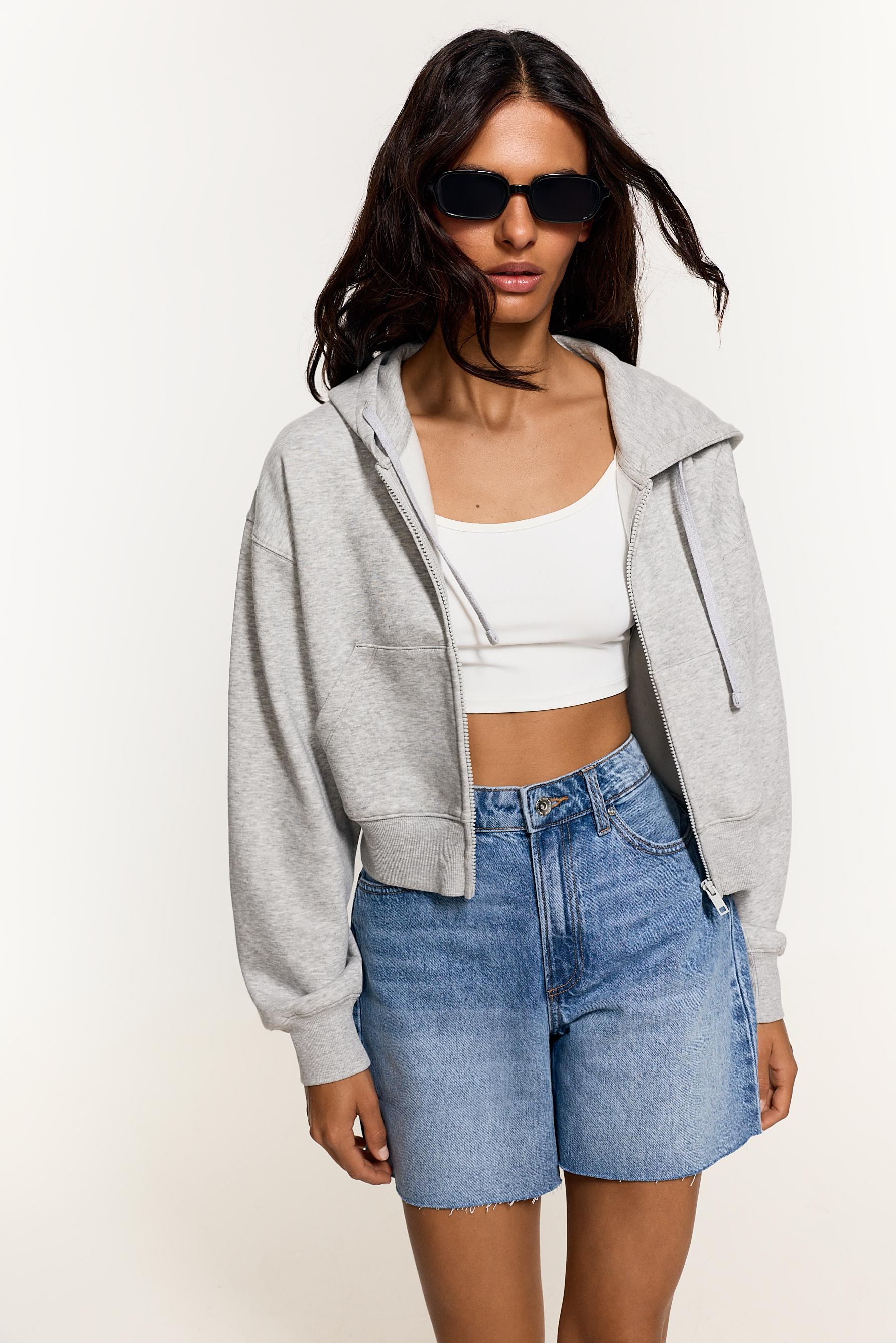 Distressed denim Bermuda shorts — PALE INDIGO