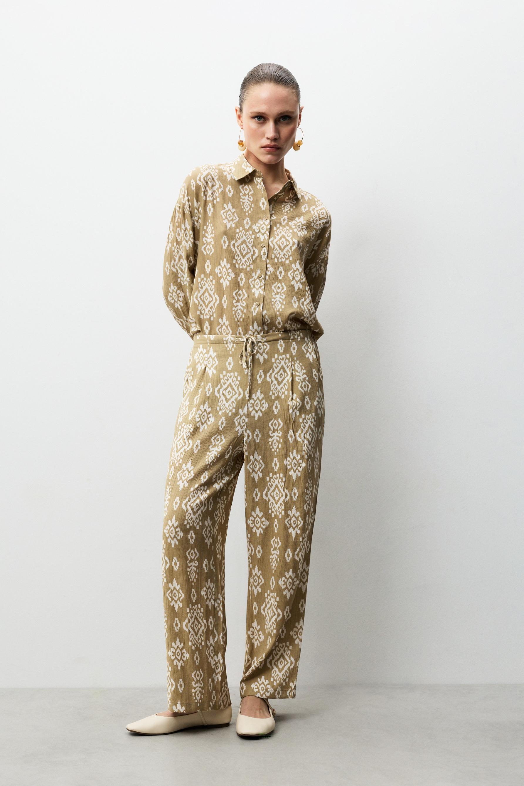 Pantalón textura pinzas