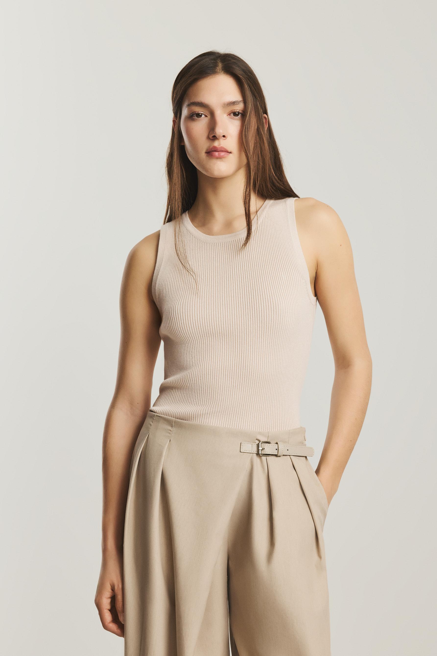 Top punto manga sisa