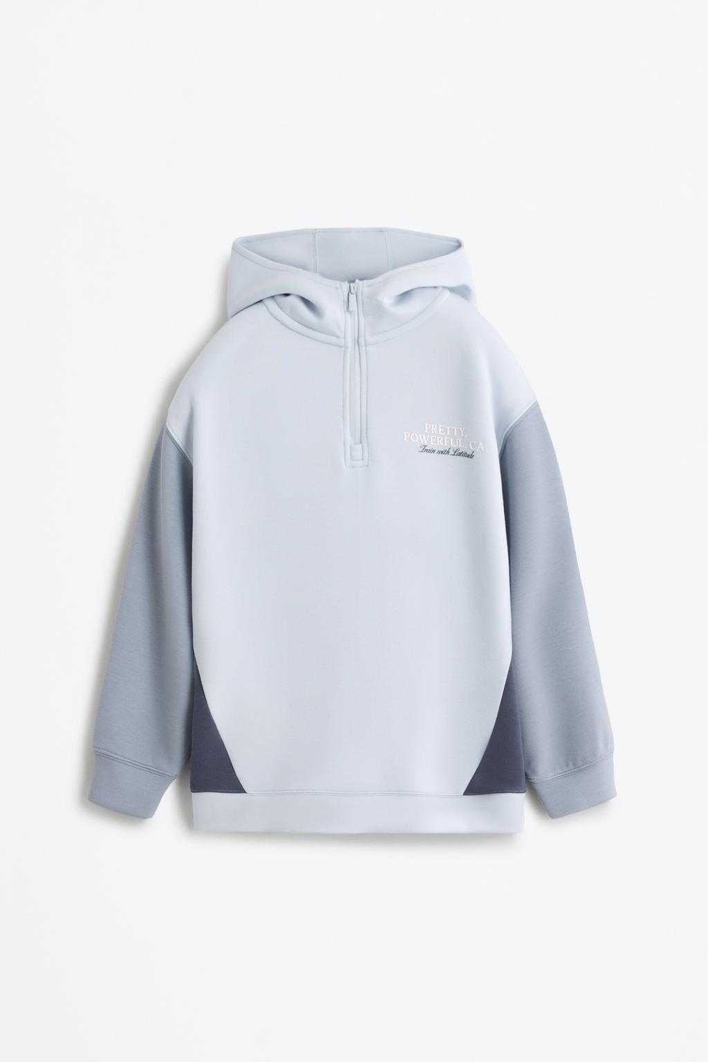 Sports hoodie with rubberised text