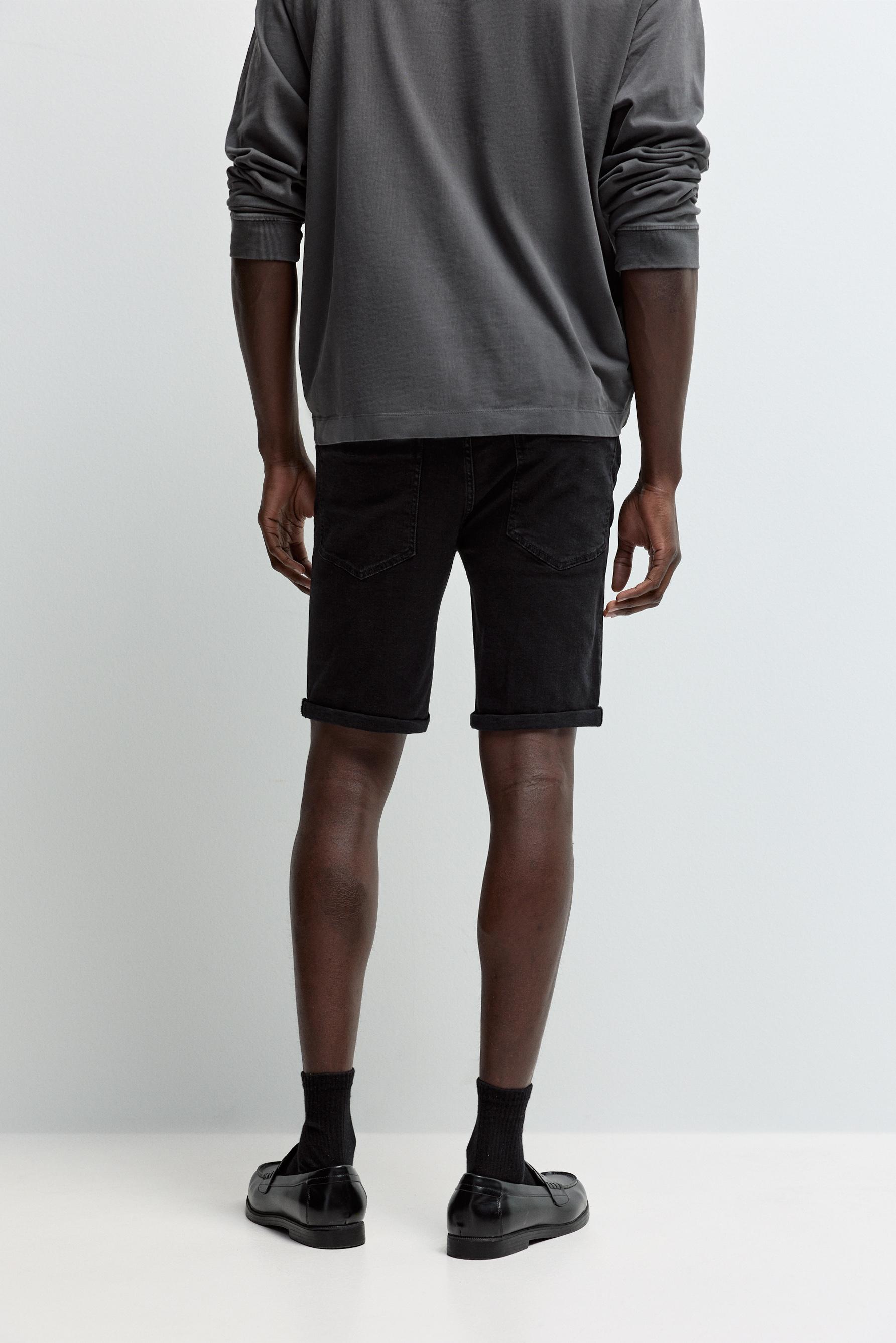 Distressed skinny denim Bermuda shorts — BLACK