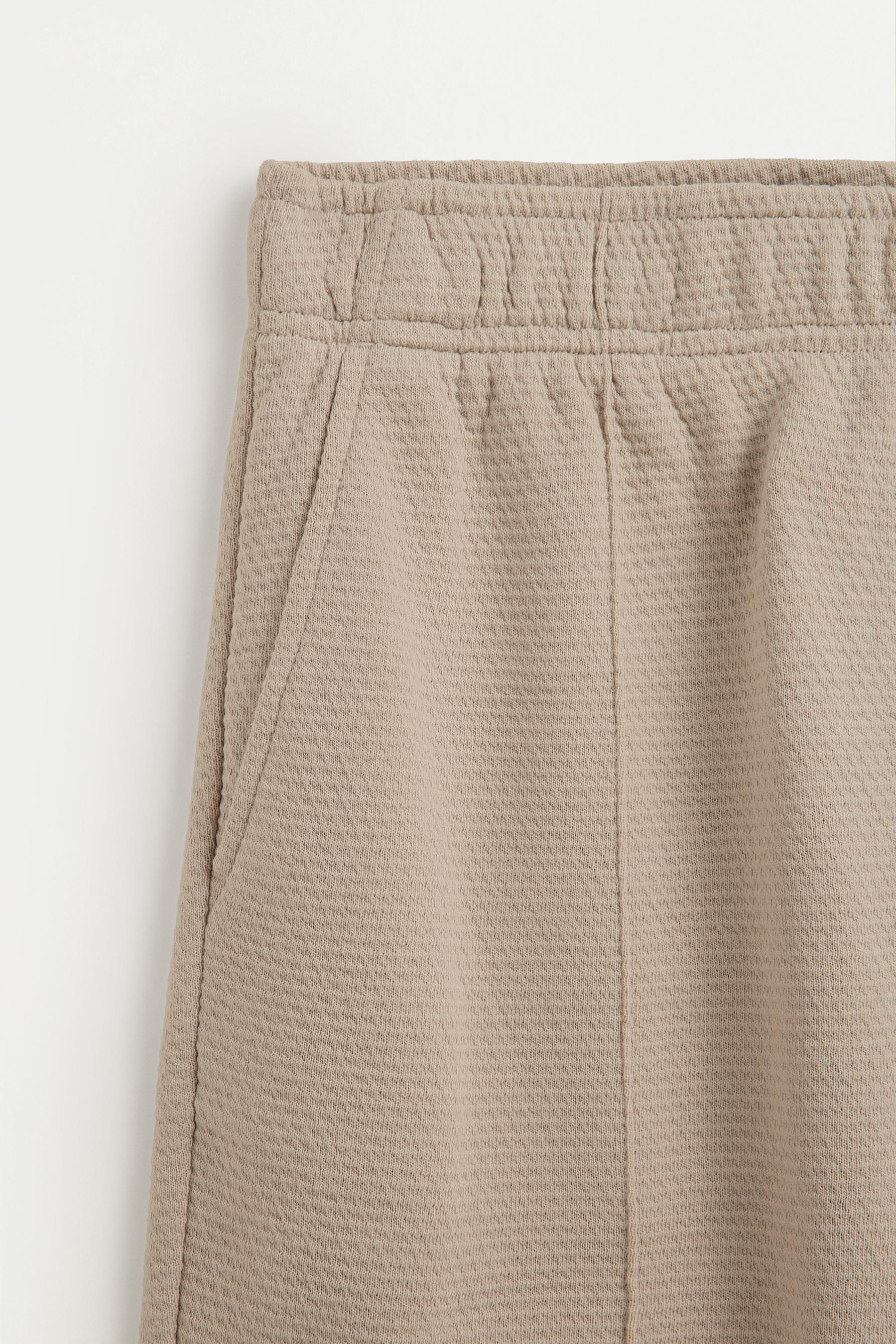 Waffle-textured Bermuda shorts — PALE SAND