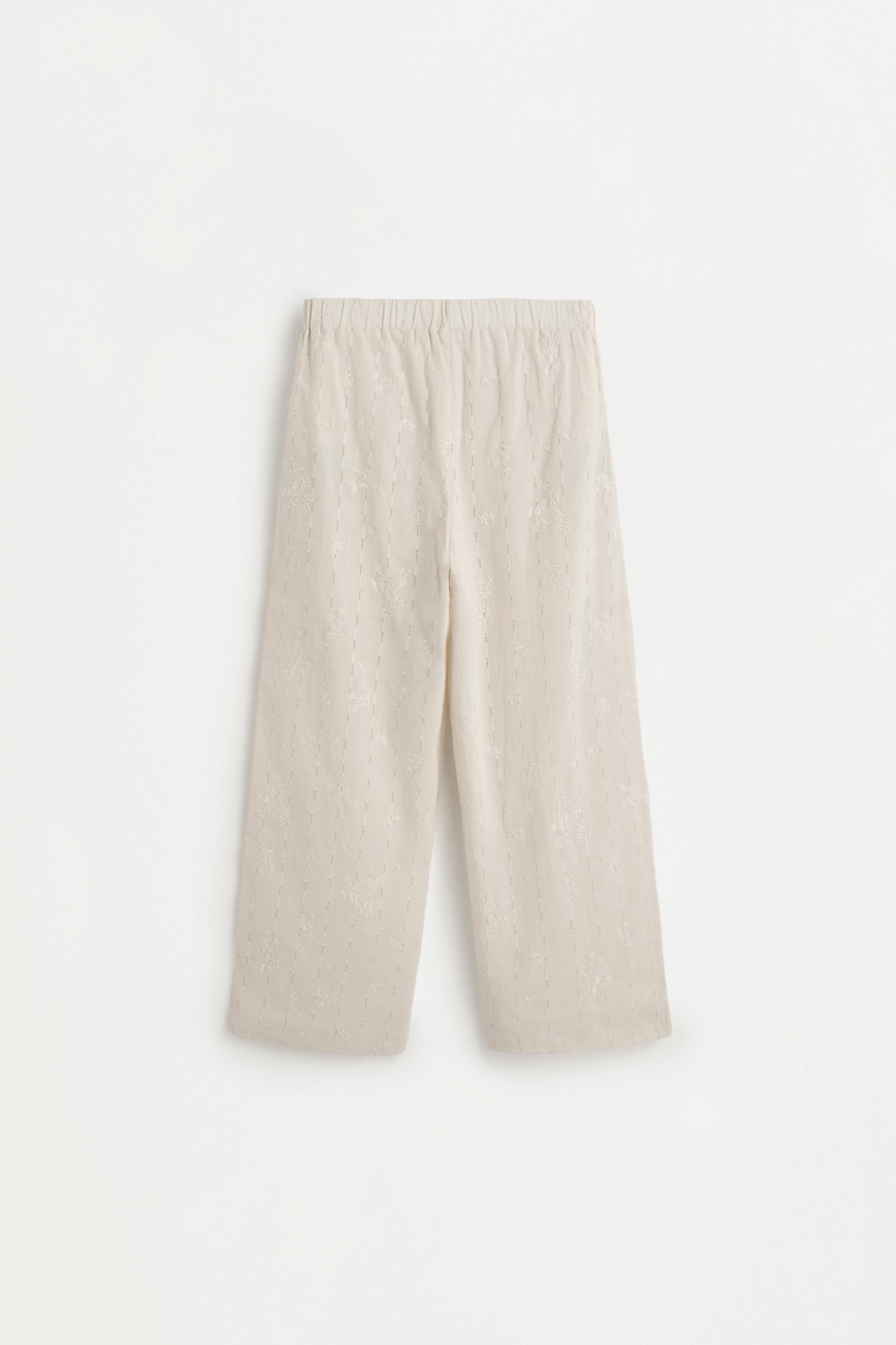 Embroidered trousers — SAND