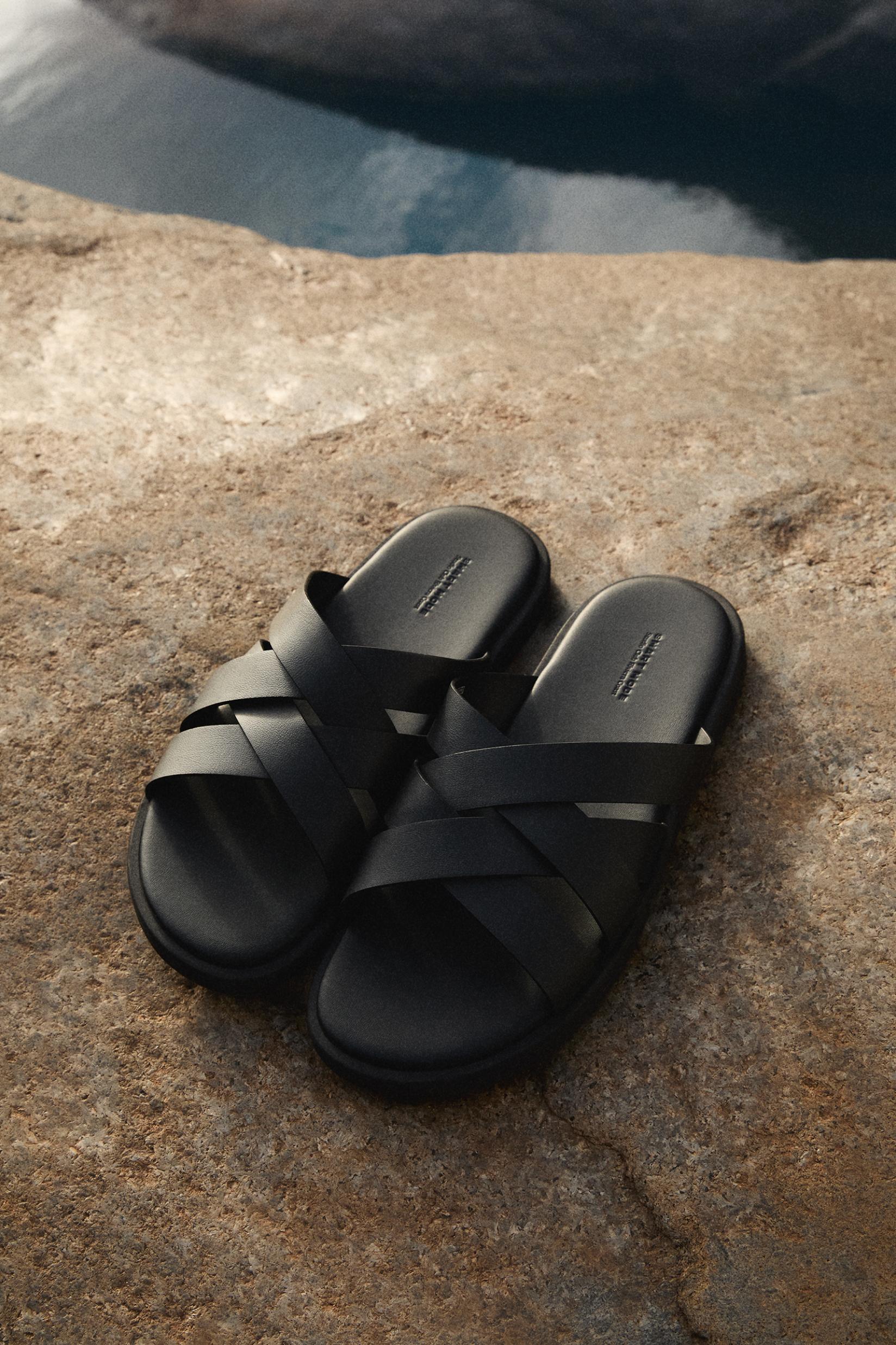 Cross-strap sandals — BLACK