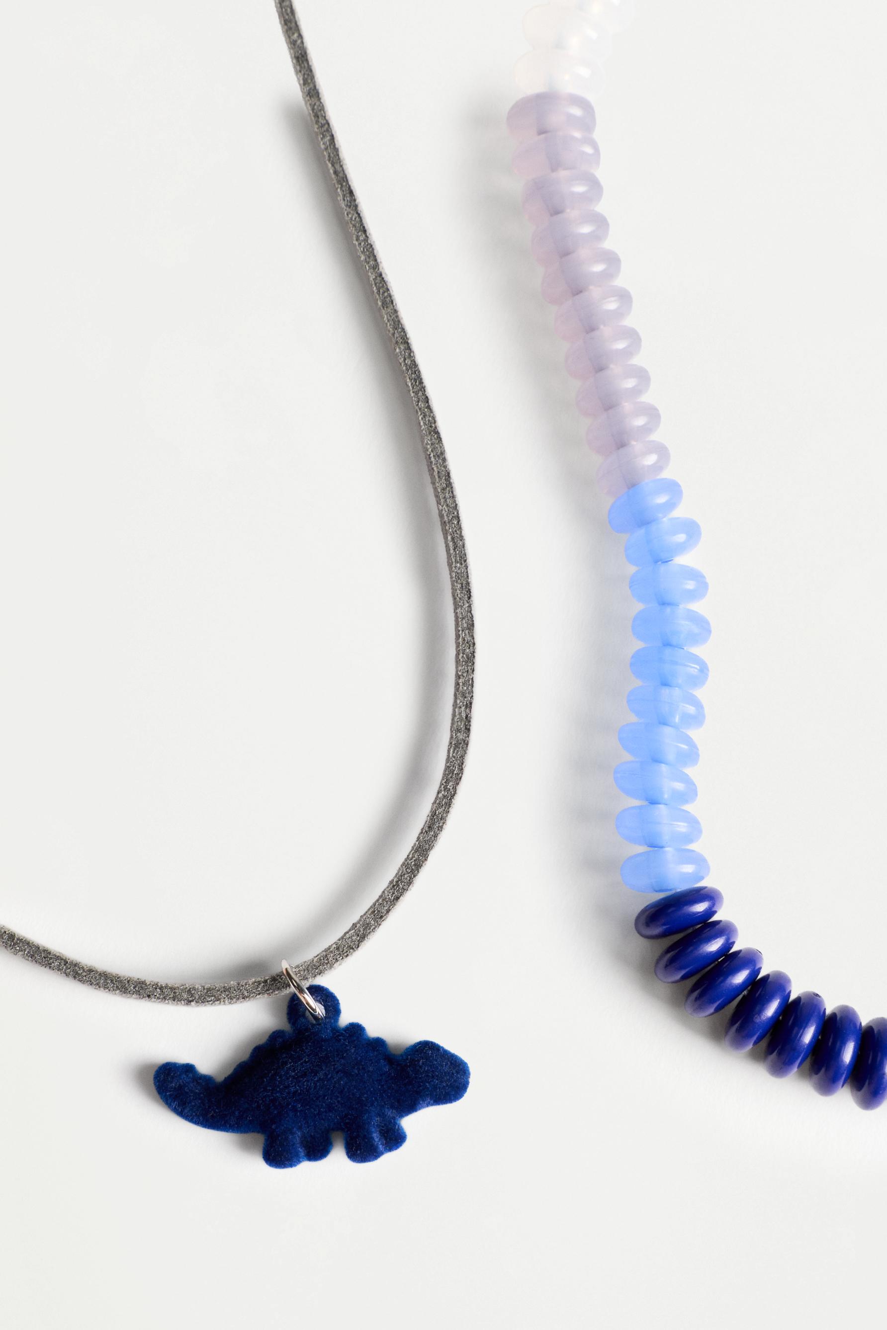 Dinosaur layered necklace — BLUE