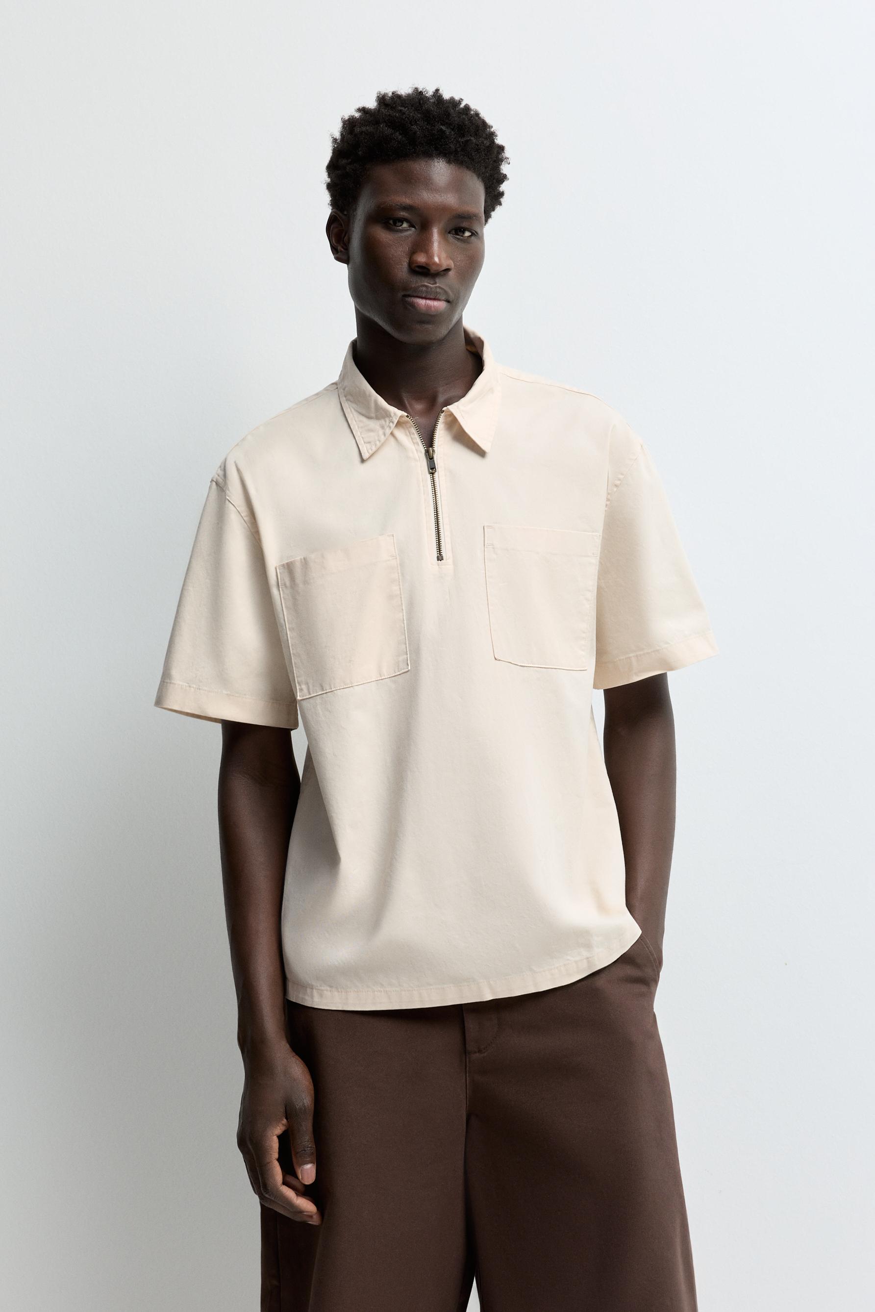 Camisa polo cremallera bolsillos