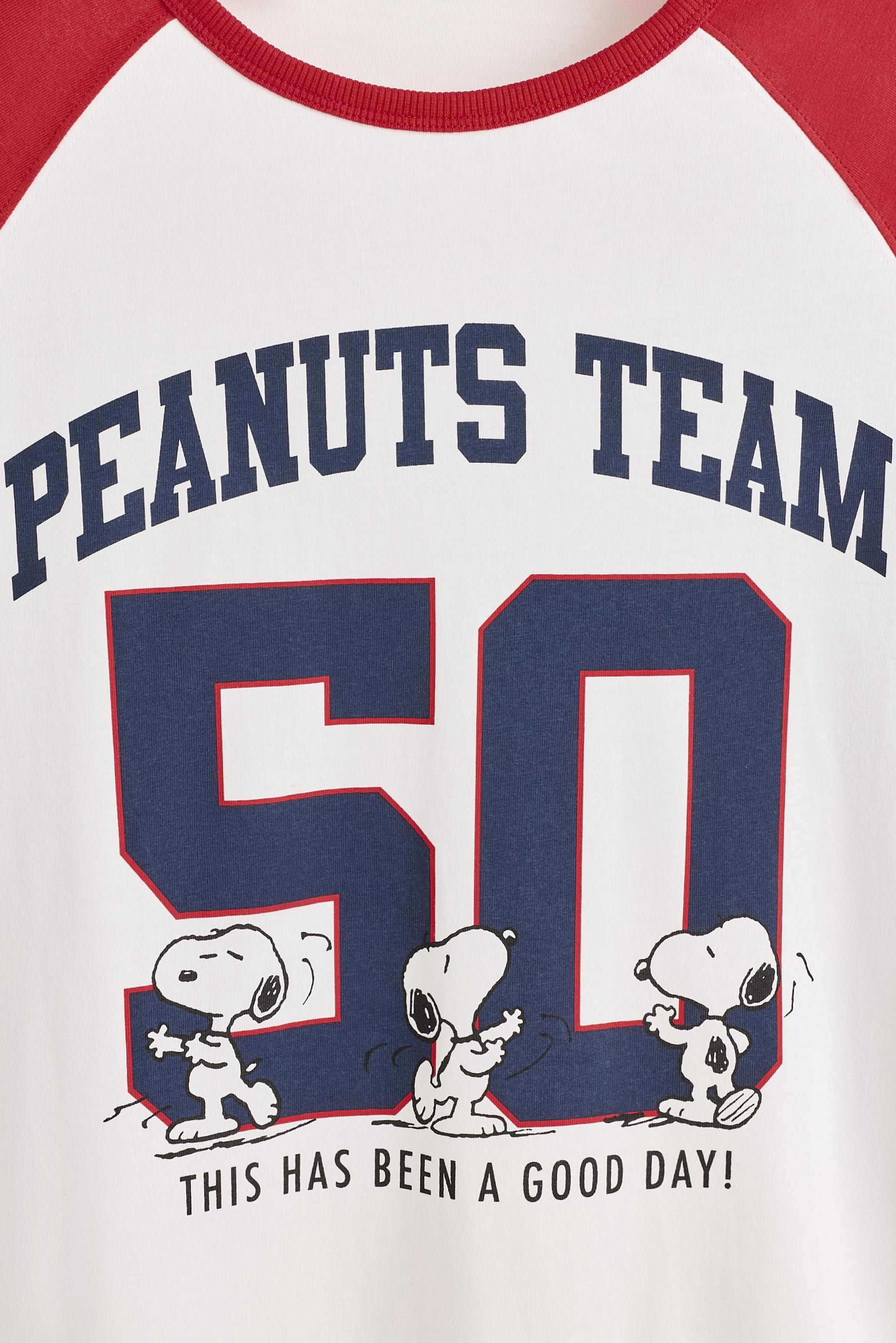 Snoopy Peanuts™ raglan sleeve T-shirt — OFF WHITE