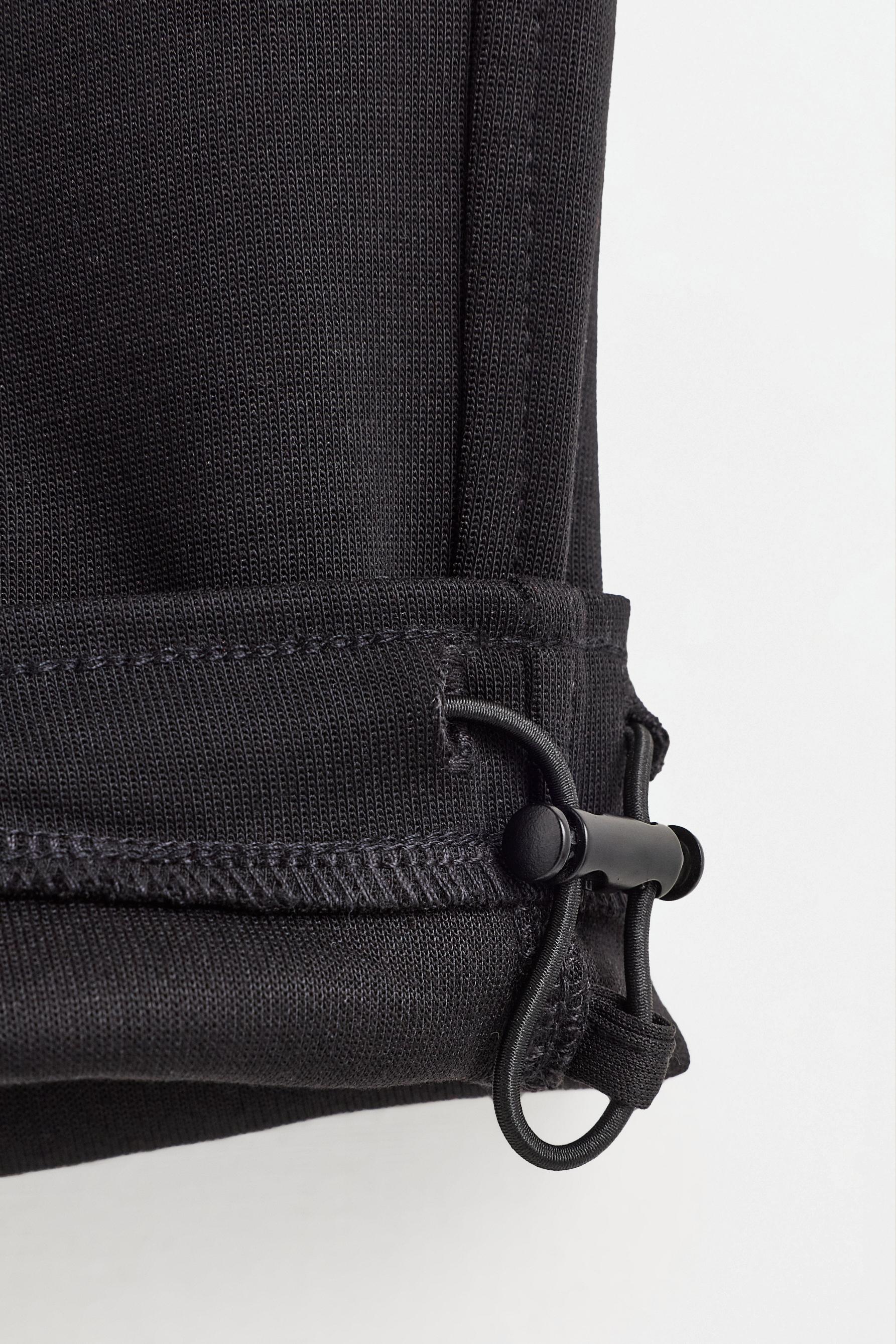 Interlock baggy joggers — BLACK
