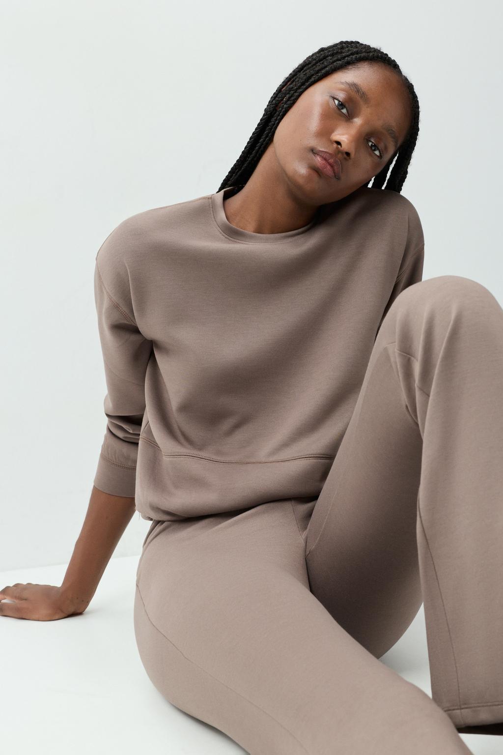 Dessuadora esportiva fluida