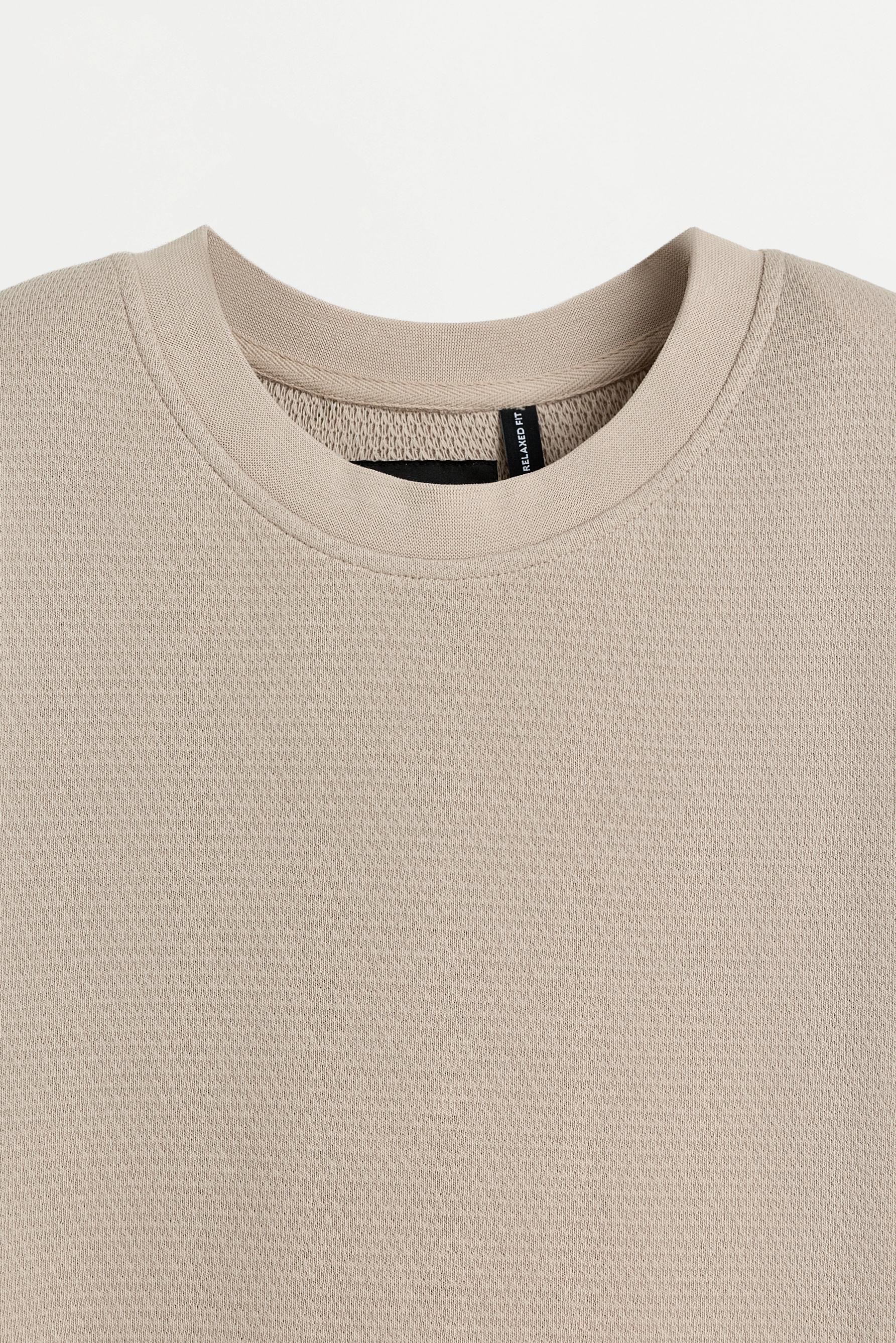 Waffle-knit textured T-shirt — PALE SAND