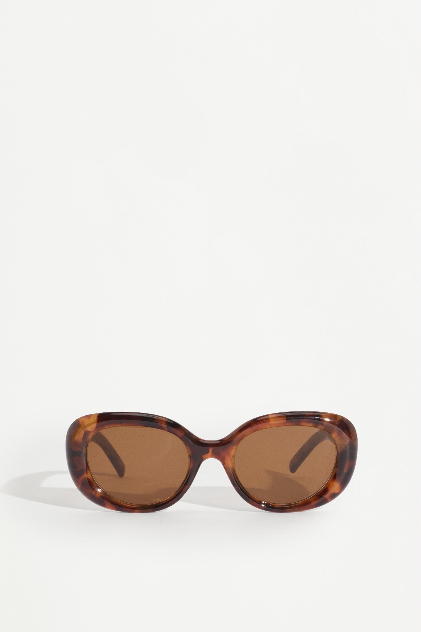 Oval tortoiseshell-effect glasses — TORTOISESHELL