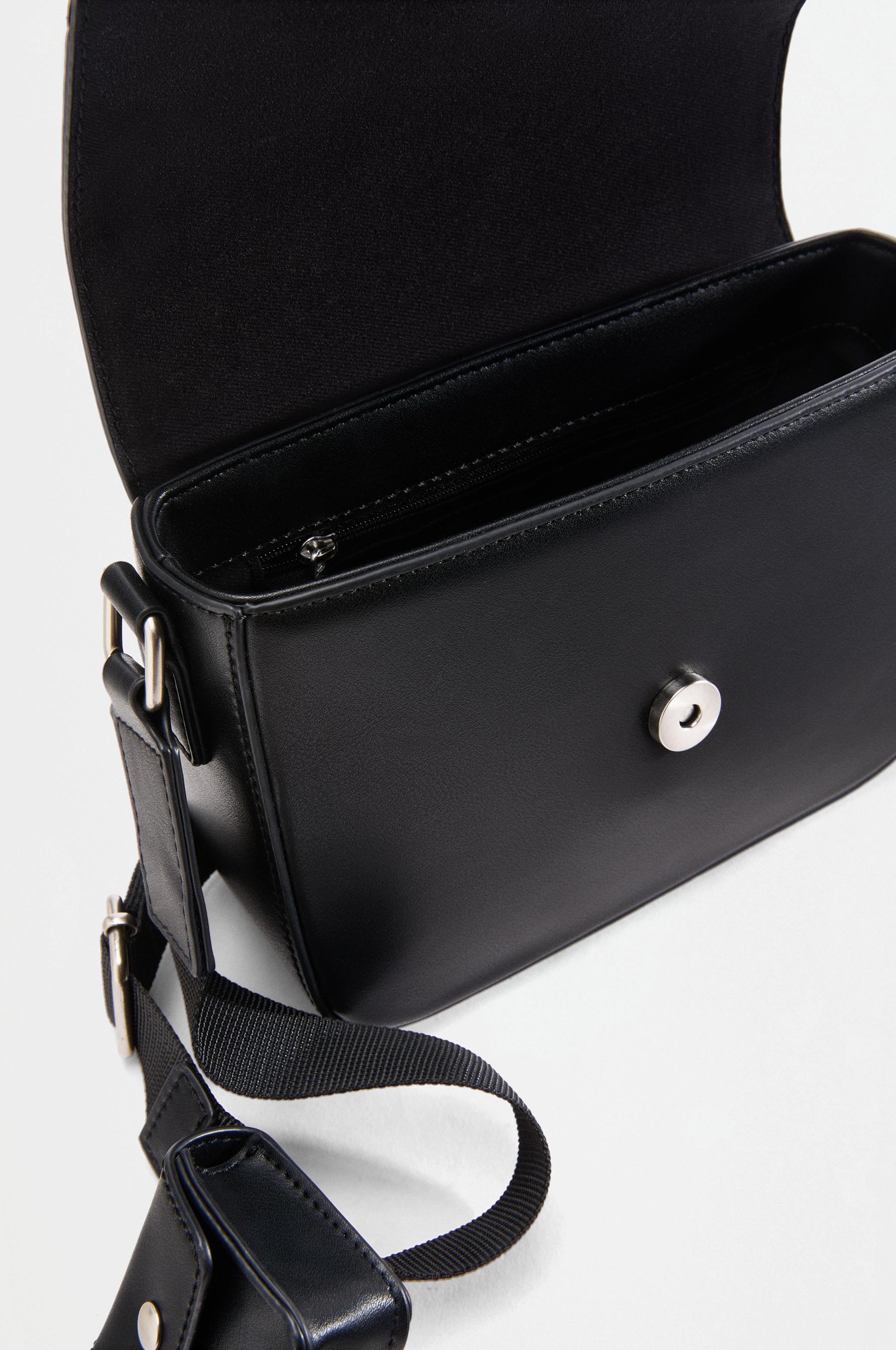 Leather effect charm crossbody bag — BLACK