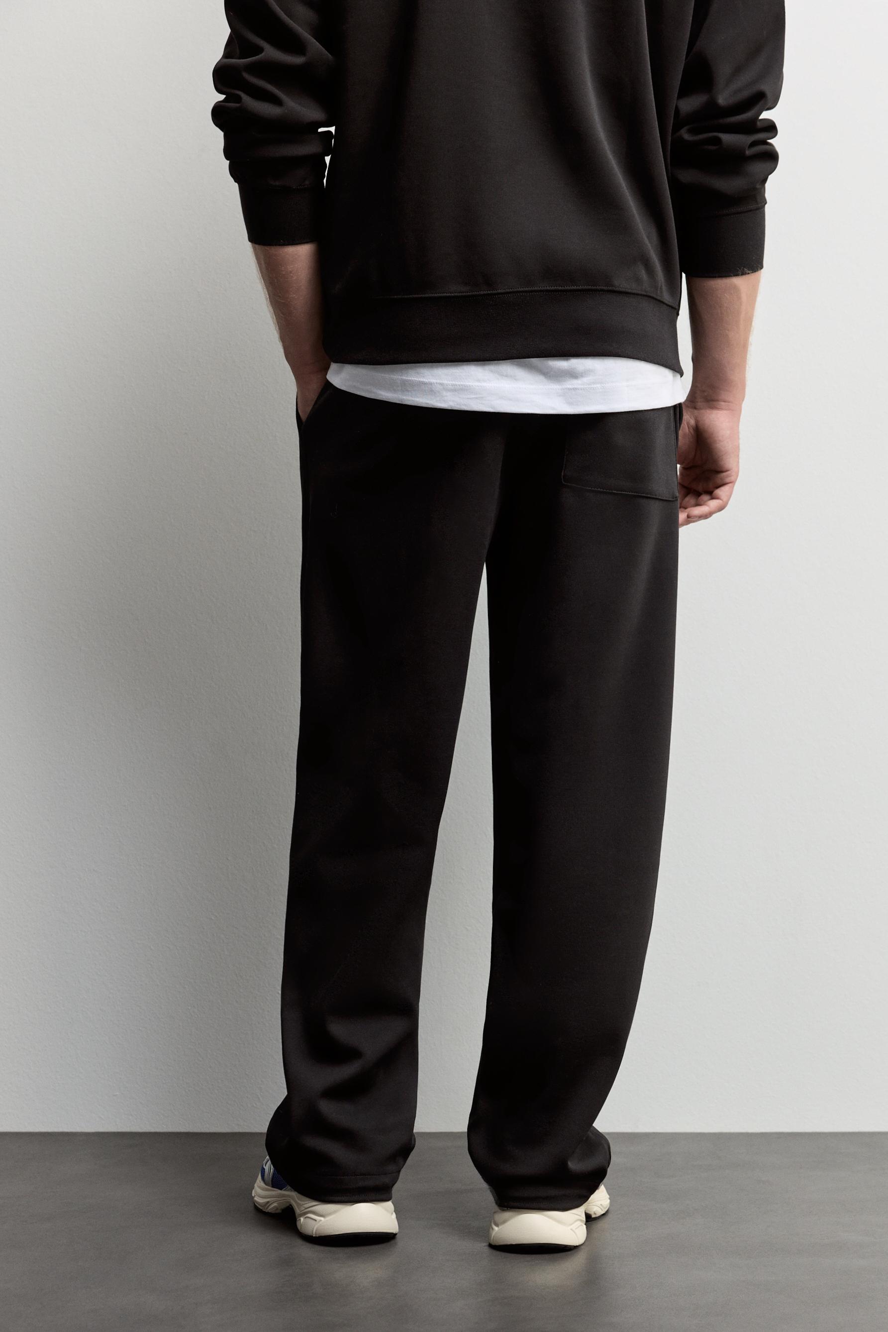 Interlock baggy joggers — BLACK