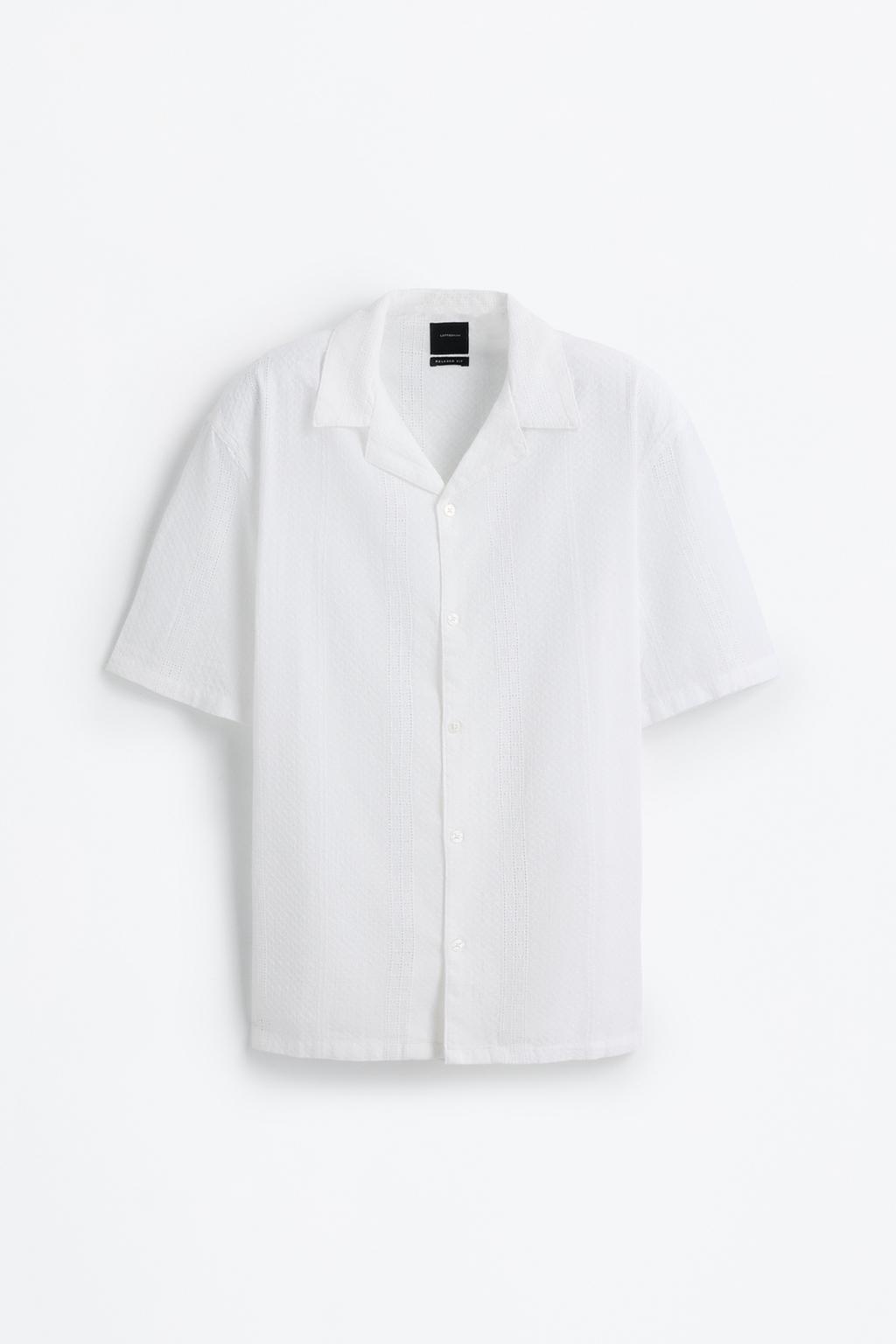 Alkandora brodatu suitzarrarekin