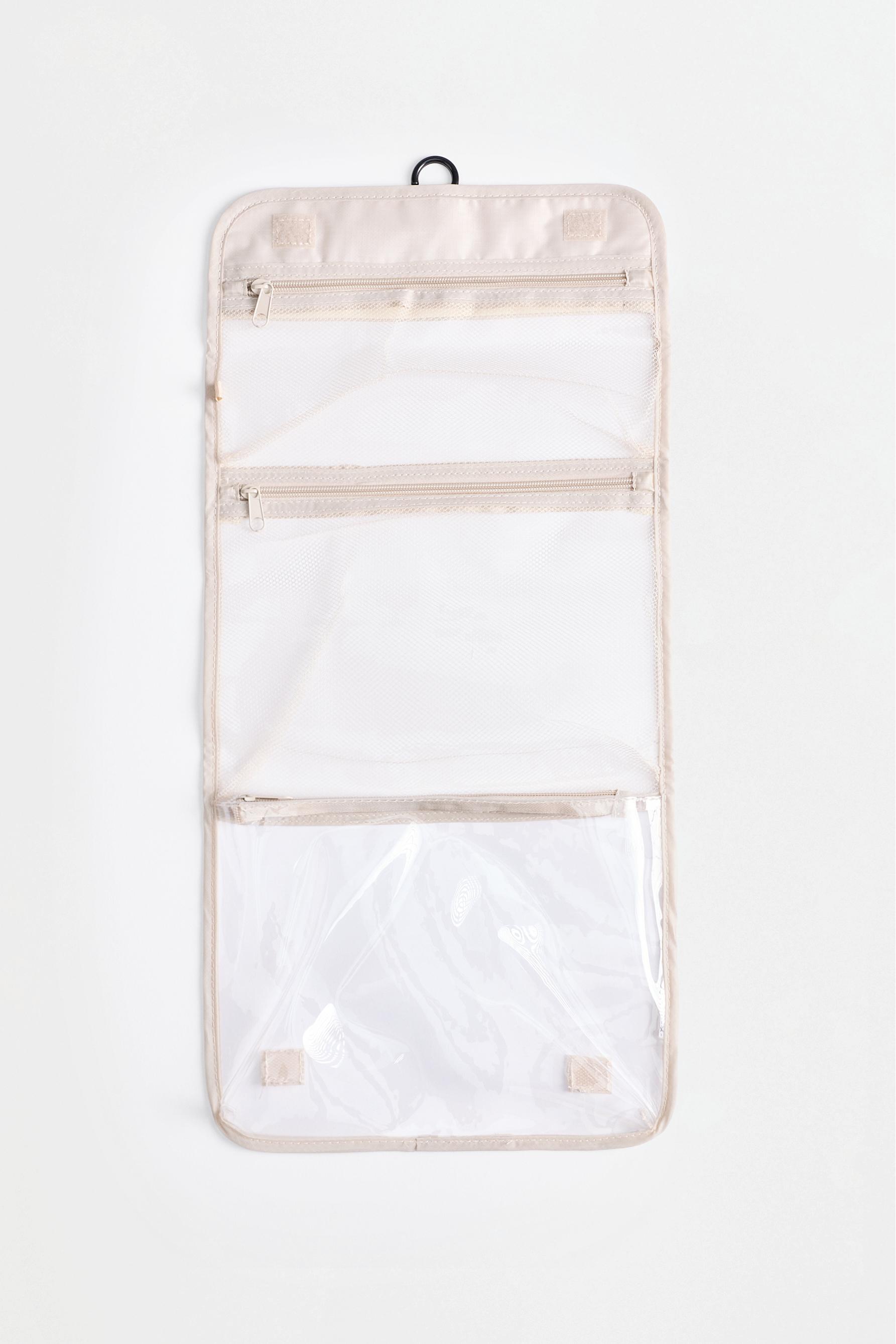Foldable travel toiletry bag — ECRU