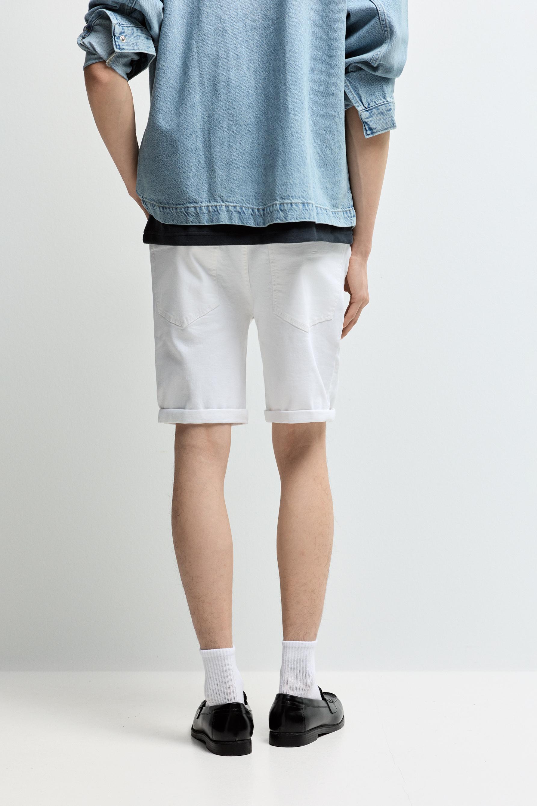 Distressed skinny denim Bermuda shorts — WHITE