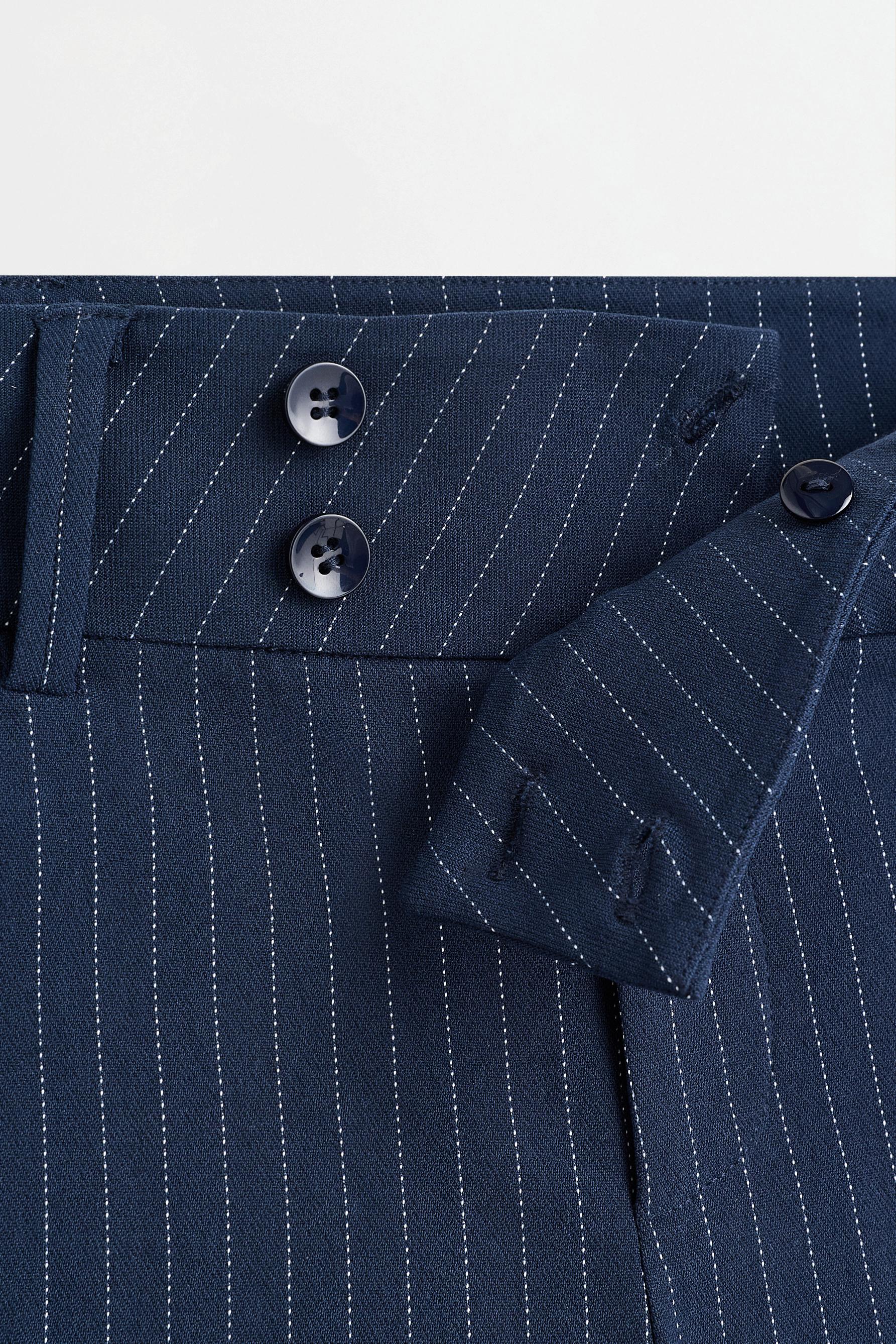 Striped bell bottom trousers — NAVY