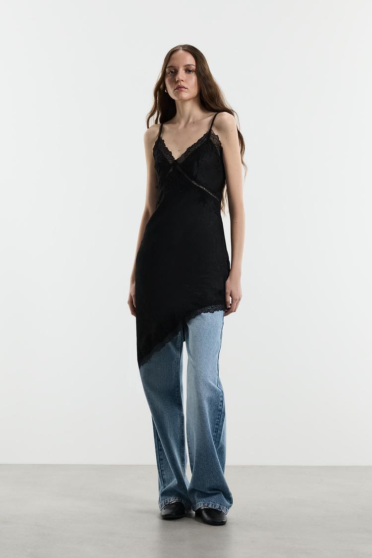 Short asymmetric slip dress — BLACK