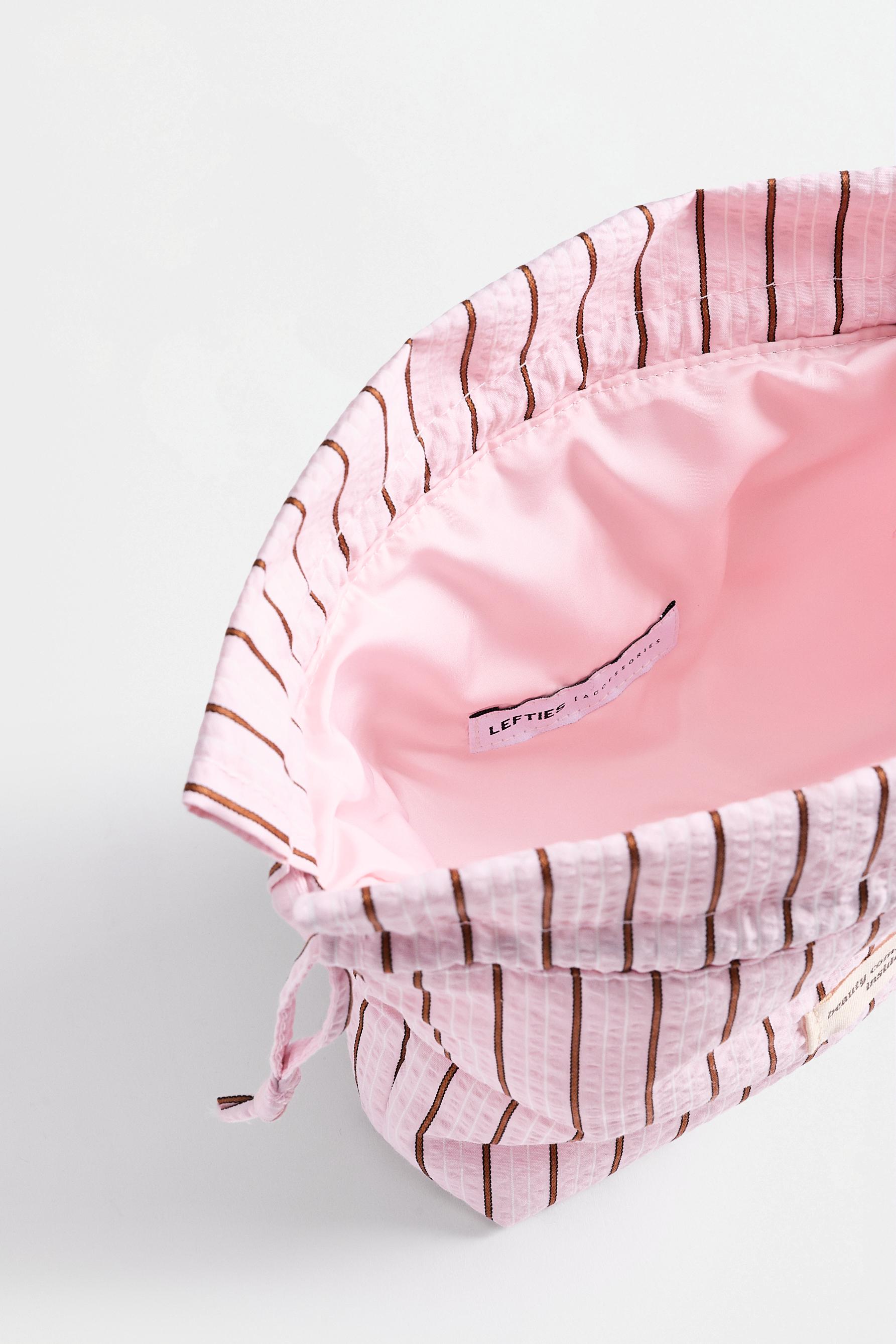 Small striped toiletry bag — ROSE PINK