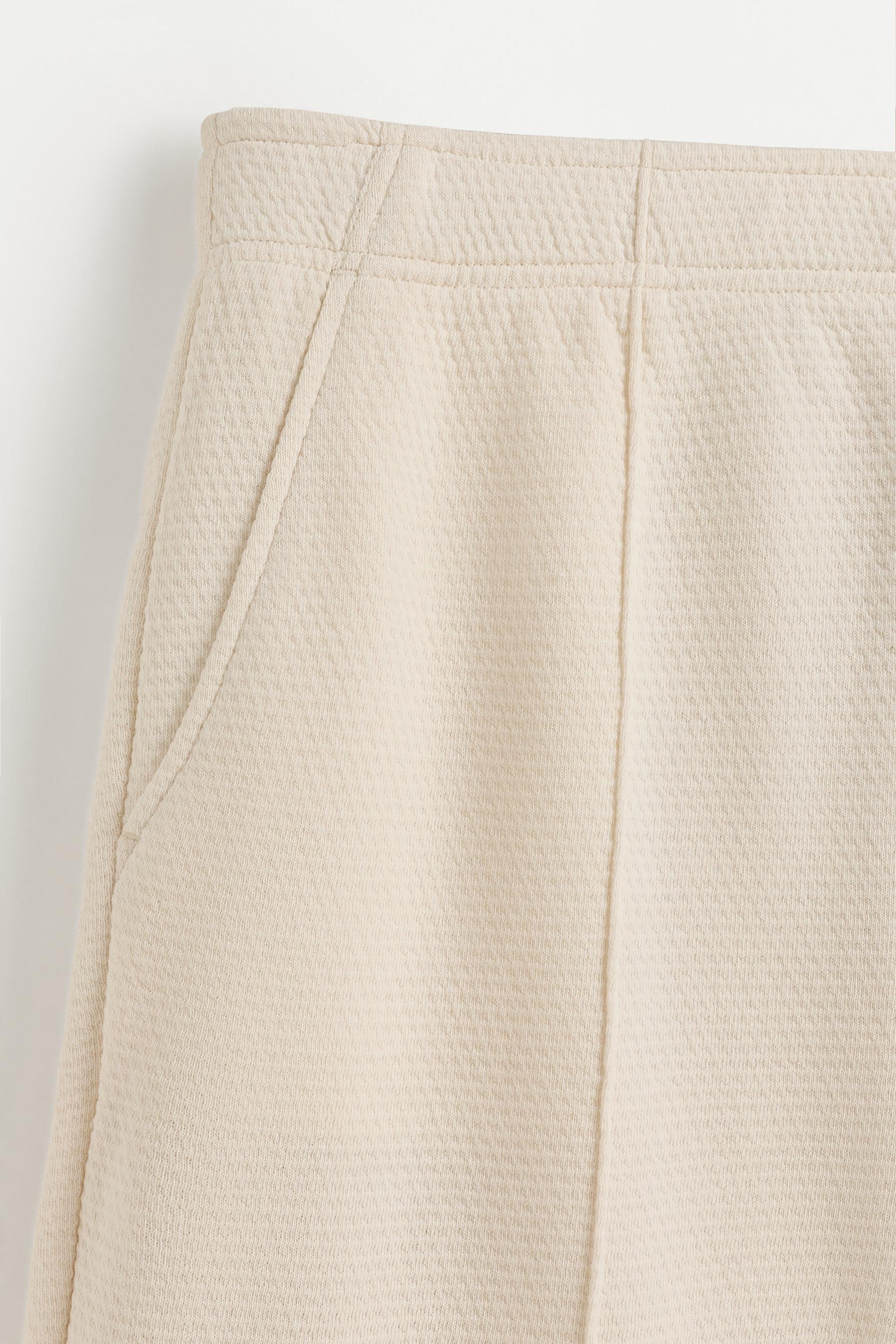 Waffle-textured Bermuda shorts — ECRU