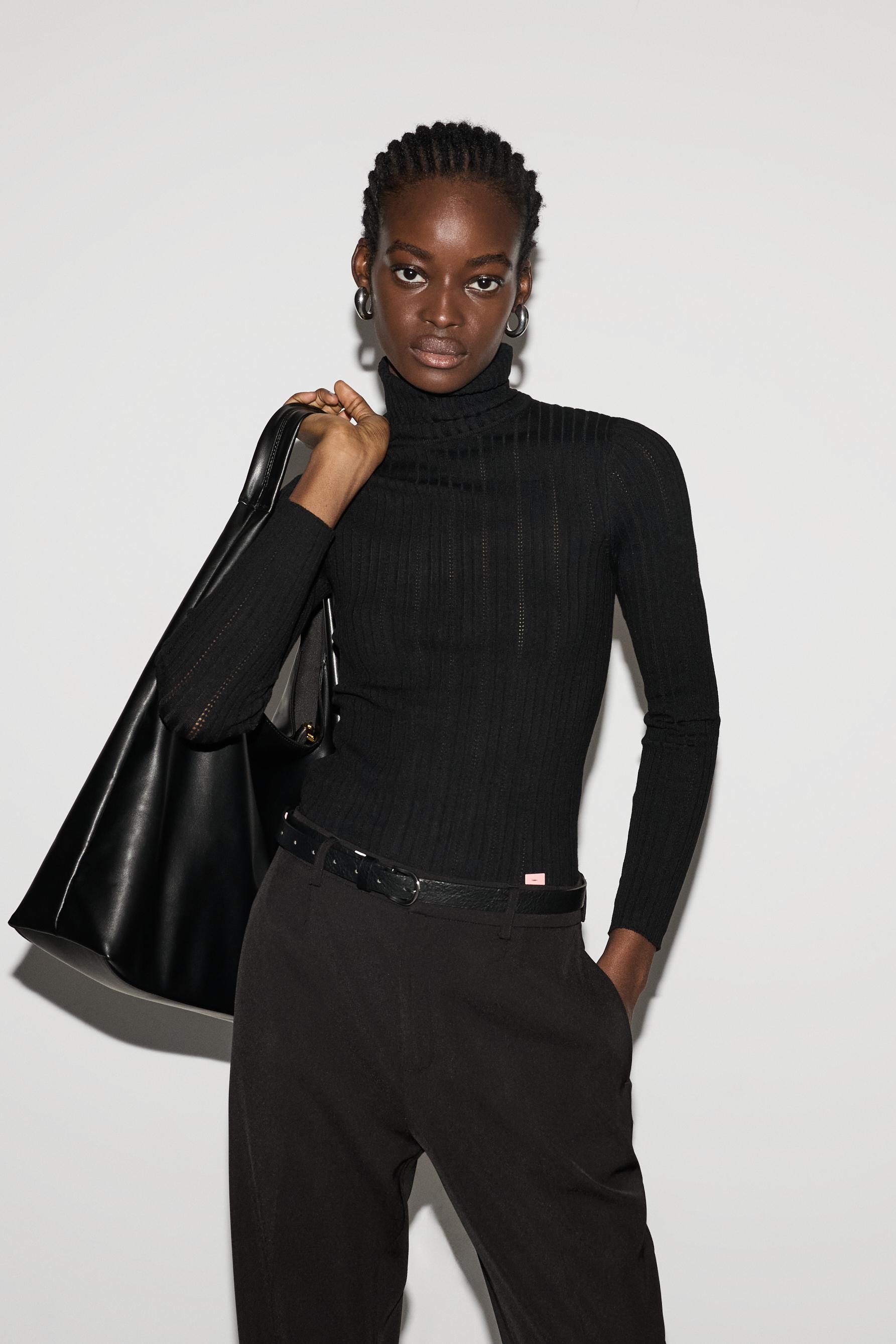 Jersey canalé cuello vuelto