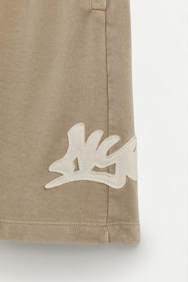 Plush Bermuda shorts with patch — OCHRE 4