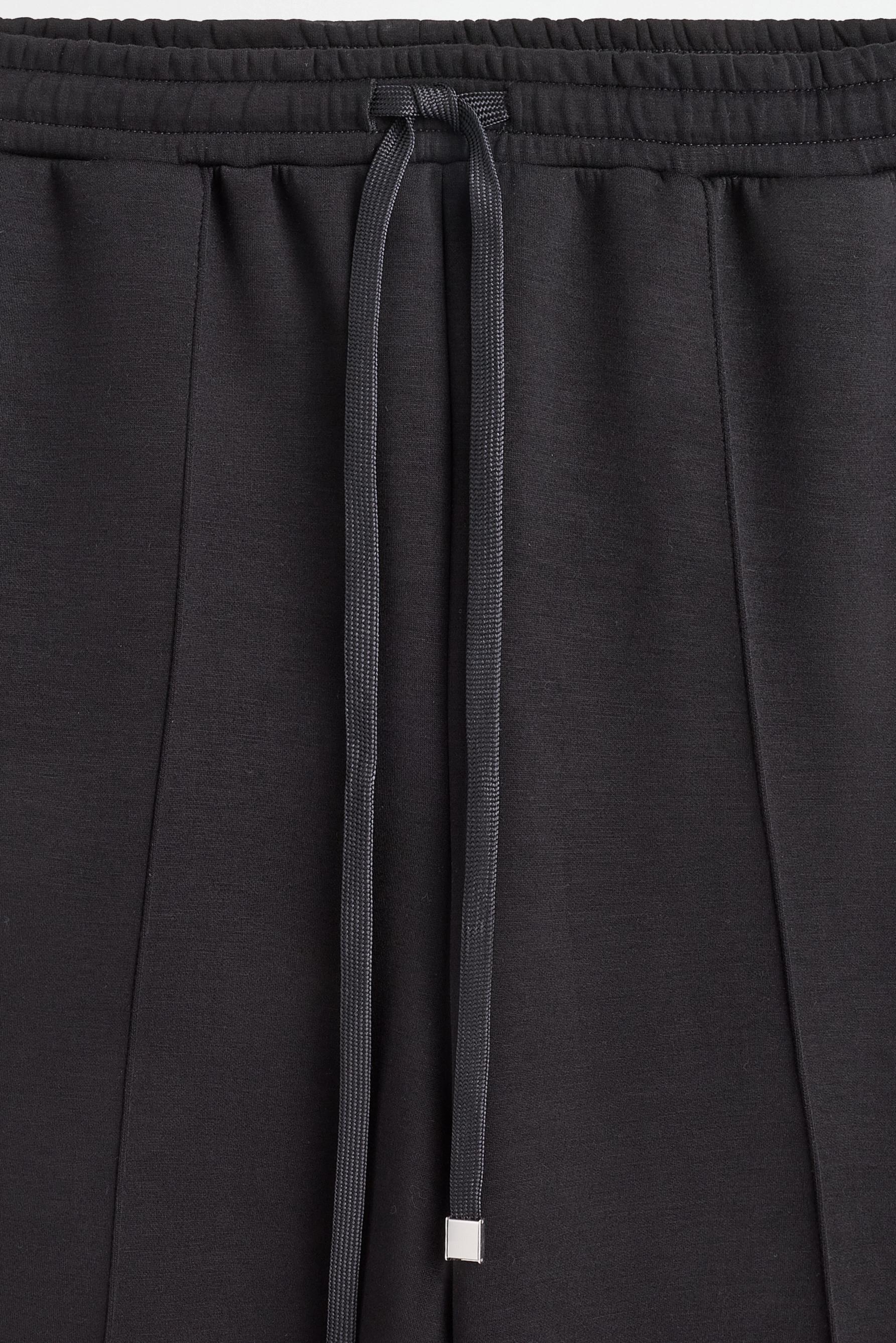 Wide-leg tracksuit trousers with front seam — BLACK