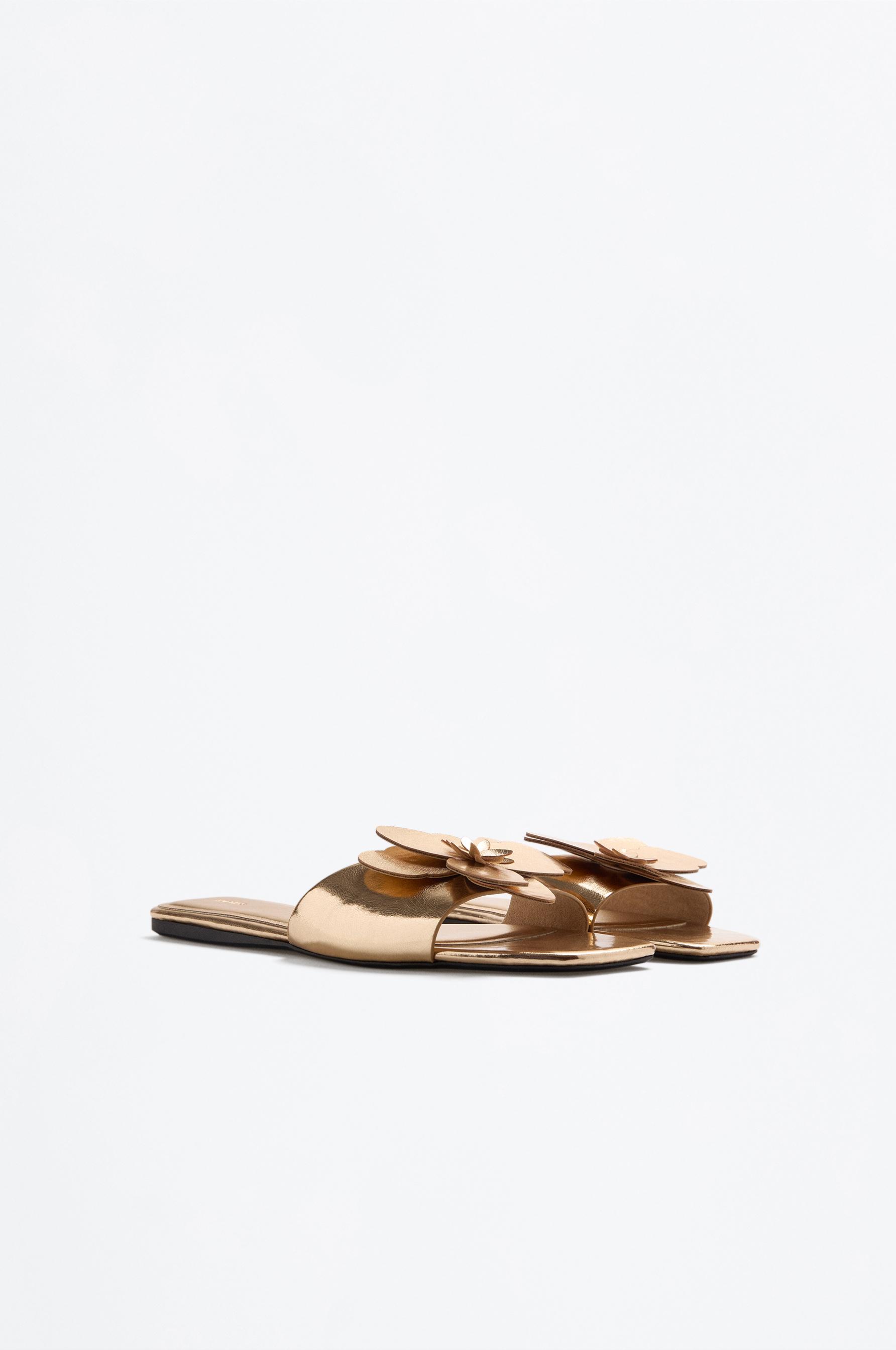 Flat slider sandals with flower detail — GOLD