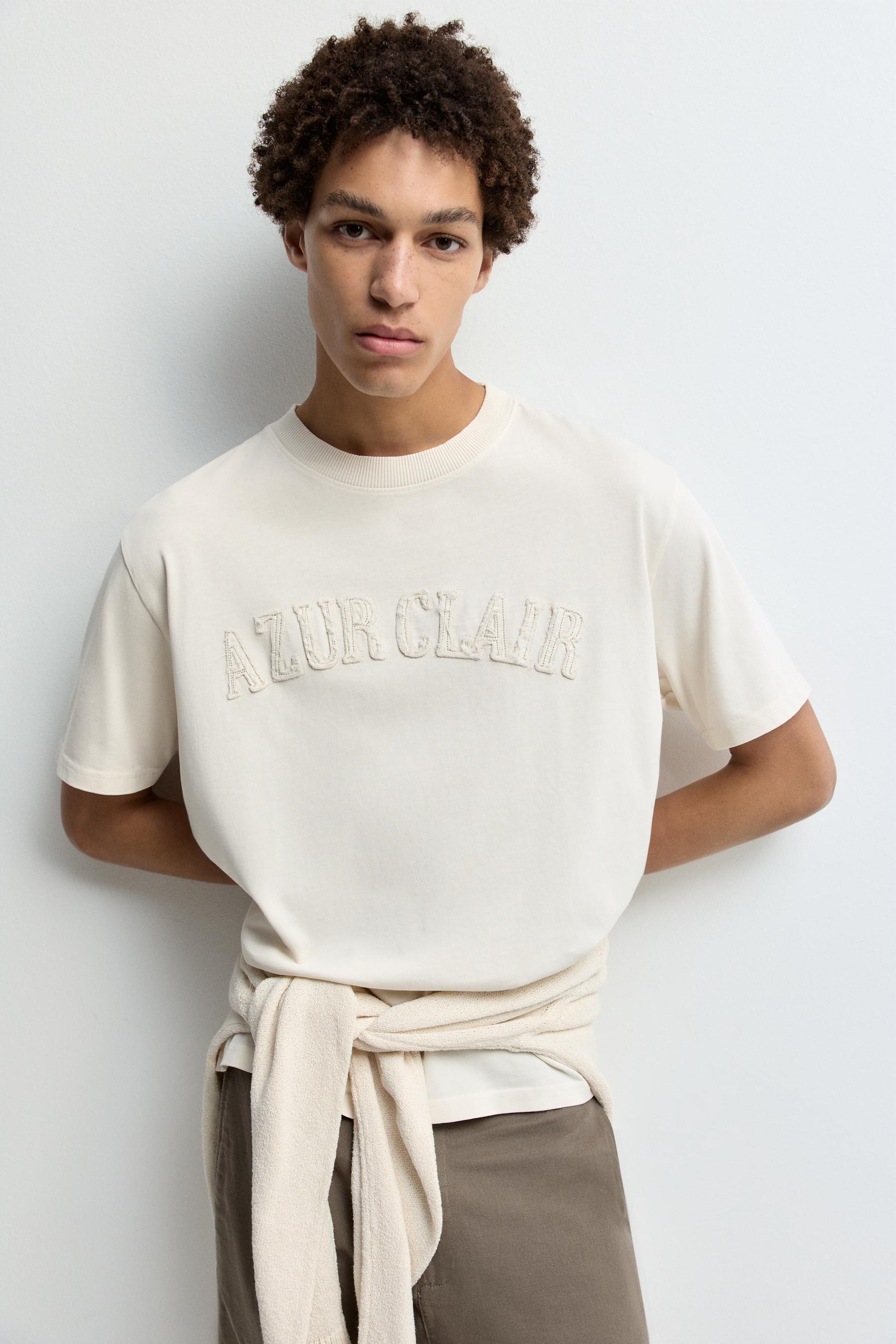 Slogan patch T-shirt — BUTTER