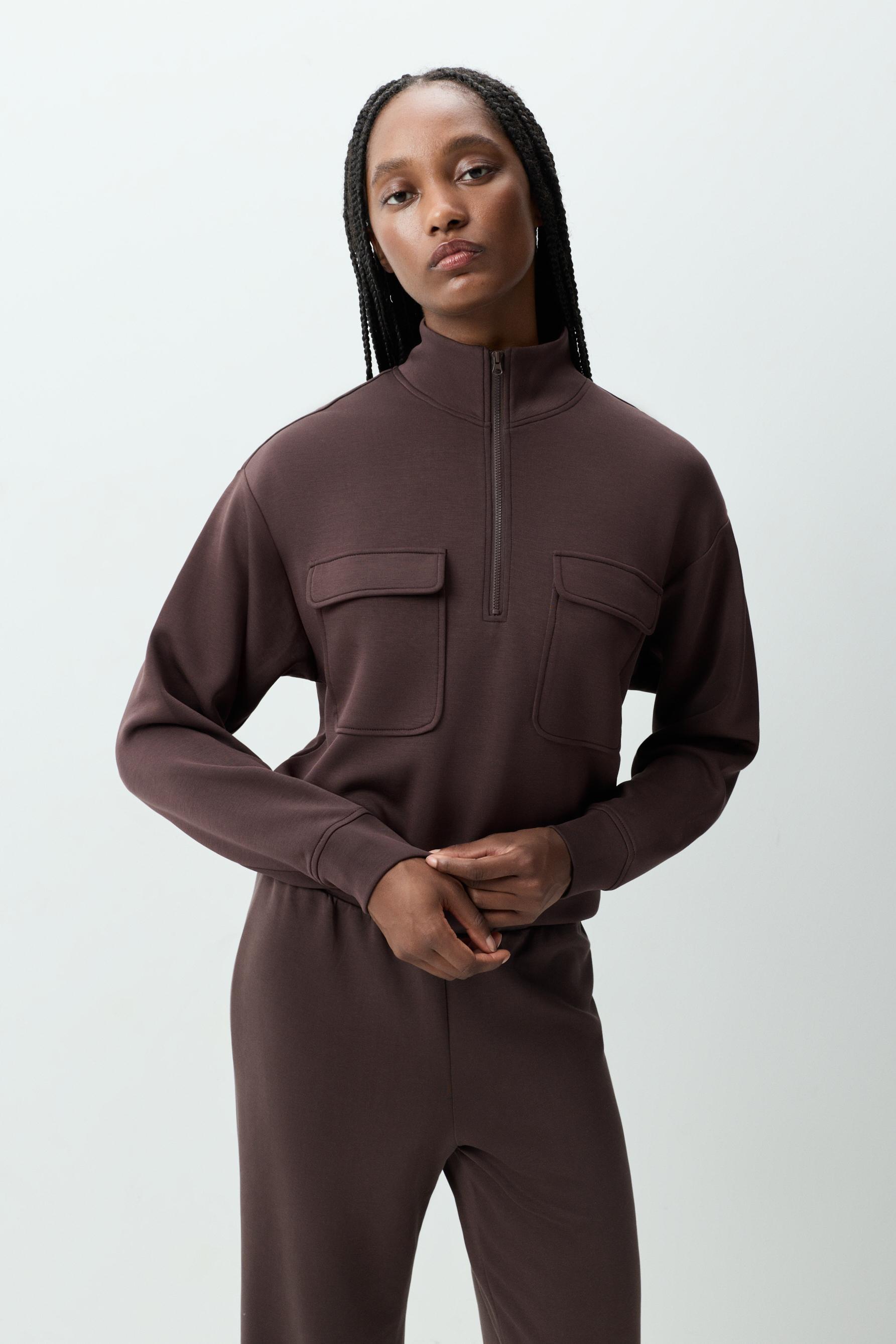 Sudadera deportiva bolsillos